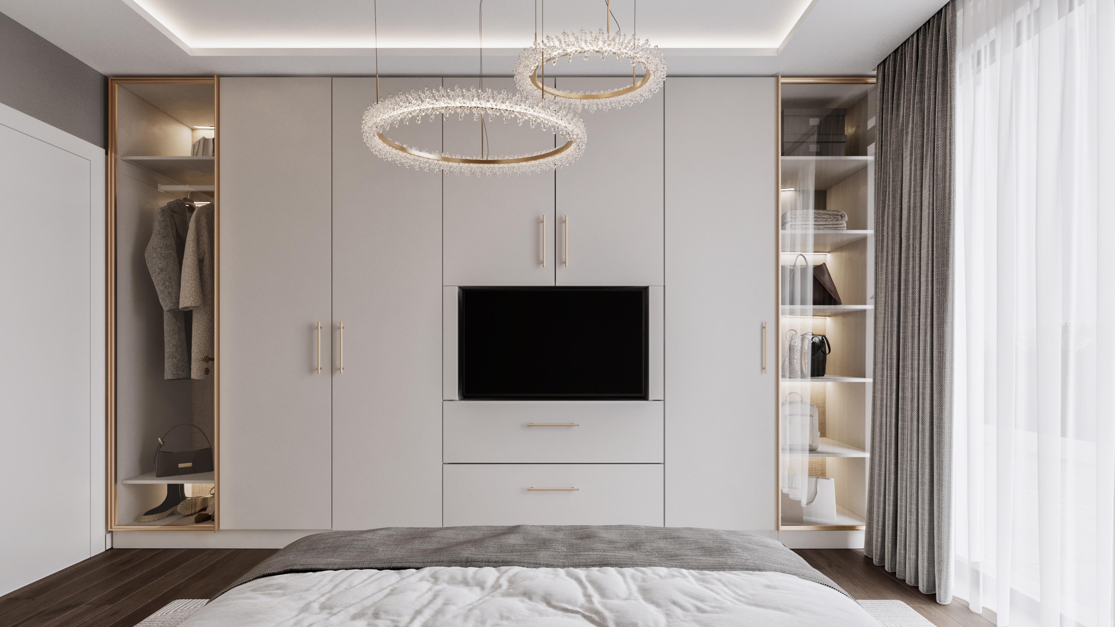 Bedroom wardrobe wall with a TV and two ring chandeliers