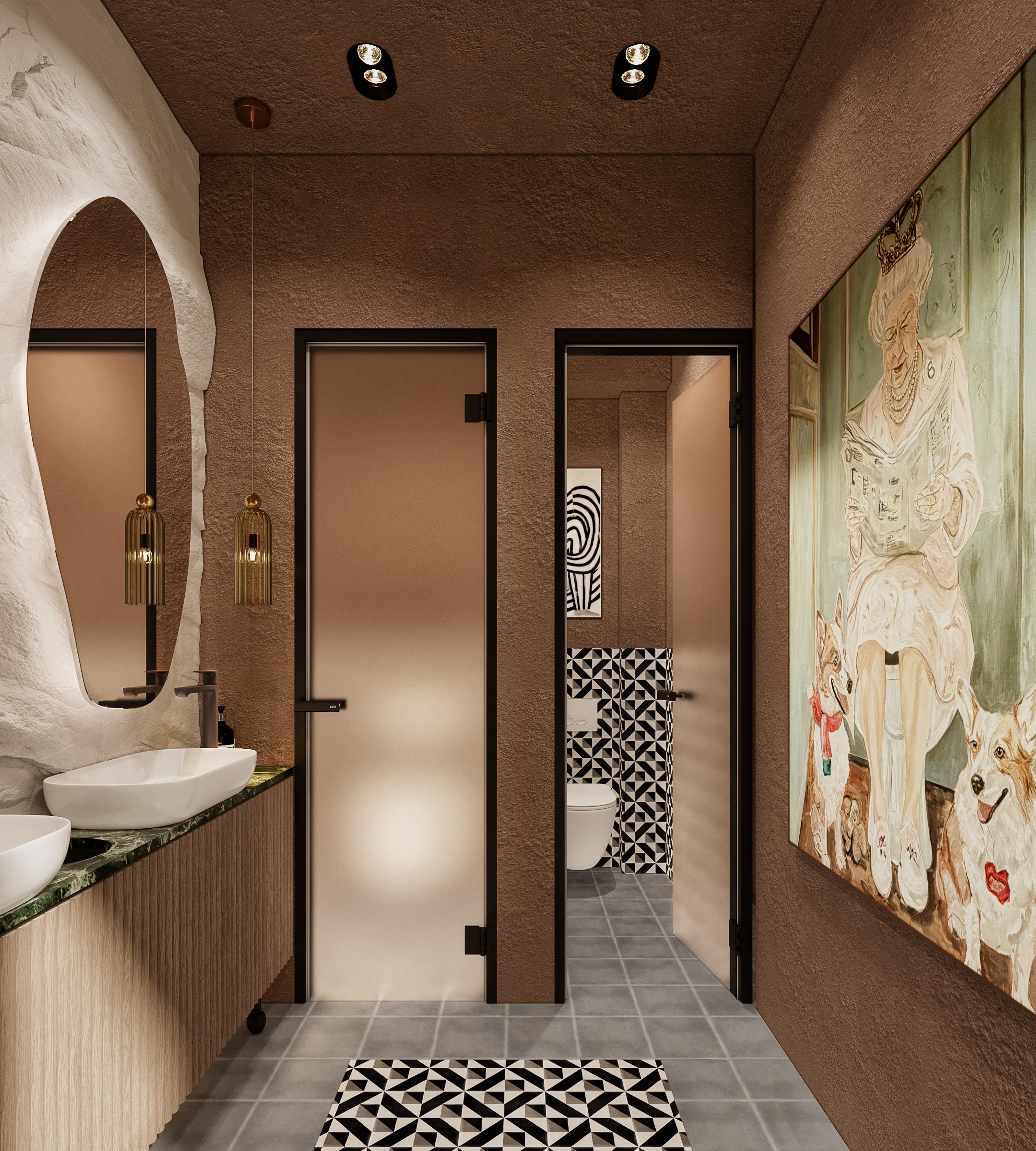 Restroom corridor with a sculpted mirror, frosted glass doors and a large illustrated artwork