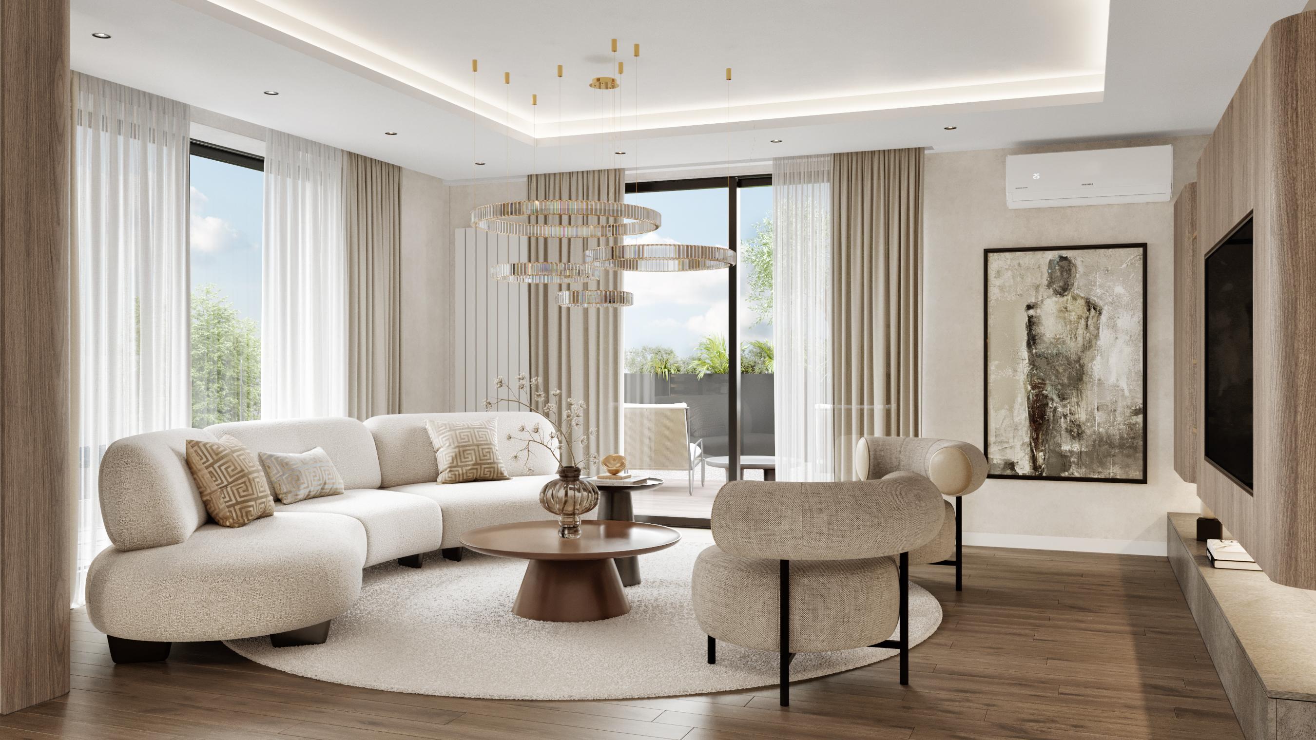 Living room with a curved cream sofa, round coffee table and a framed figure artwork