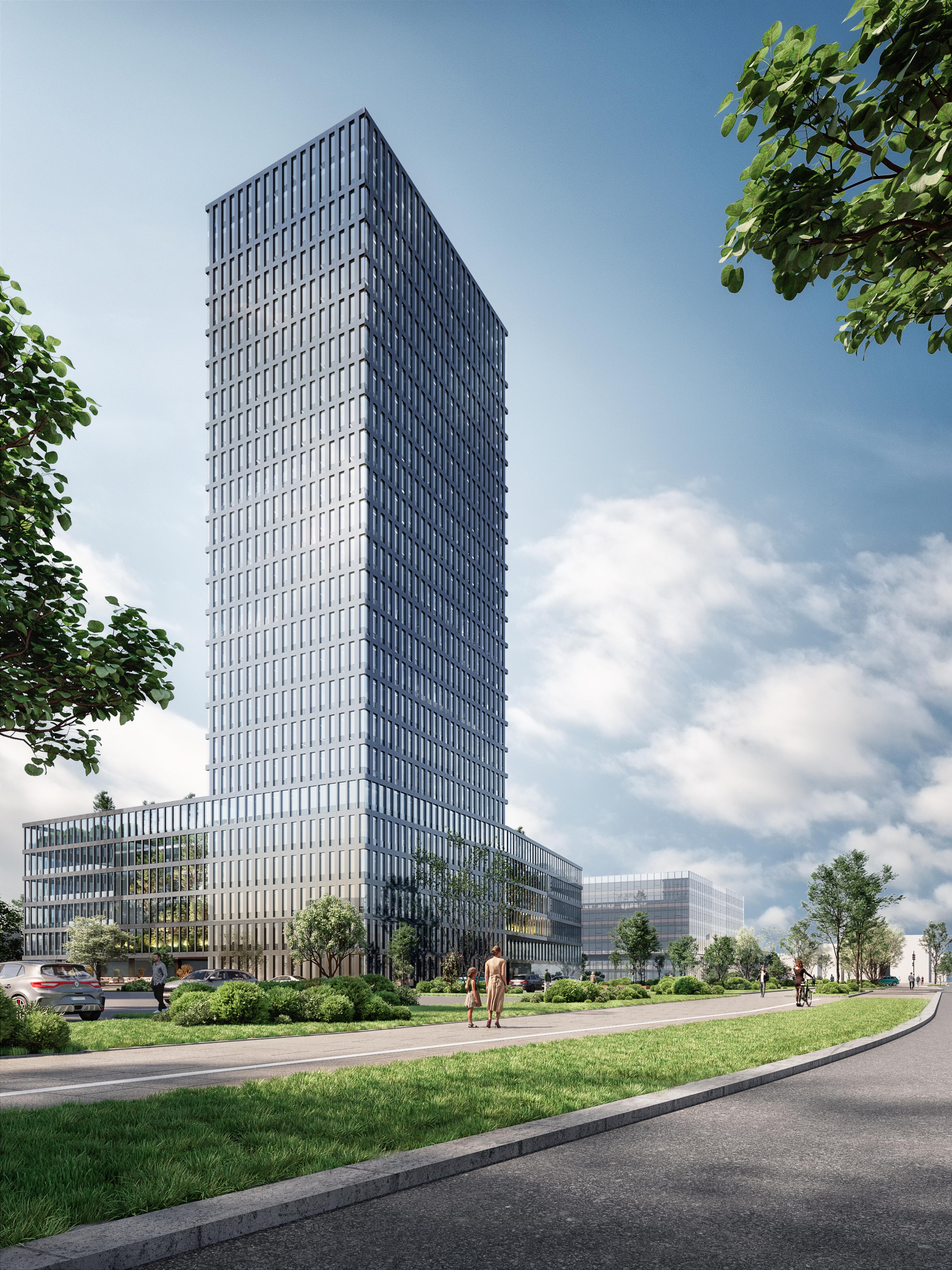 Tall glass office tower rising above a low glazed building, viewed from a curved road