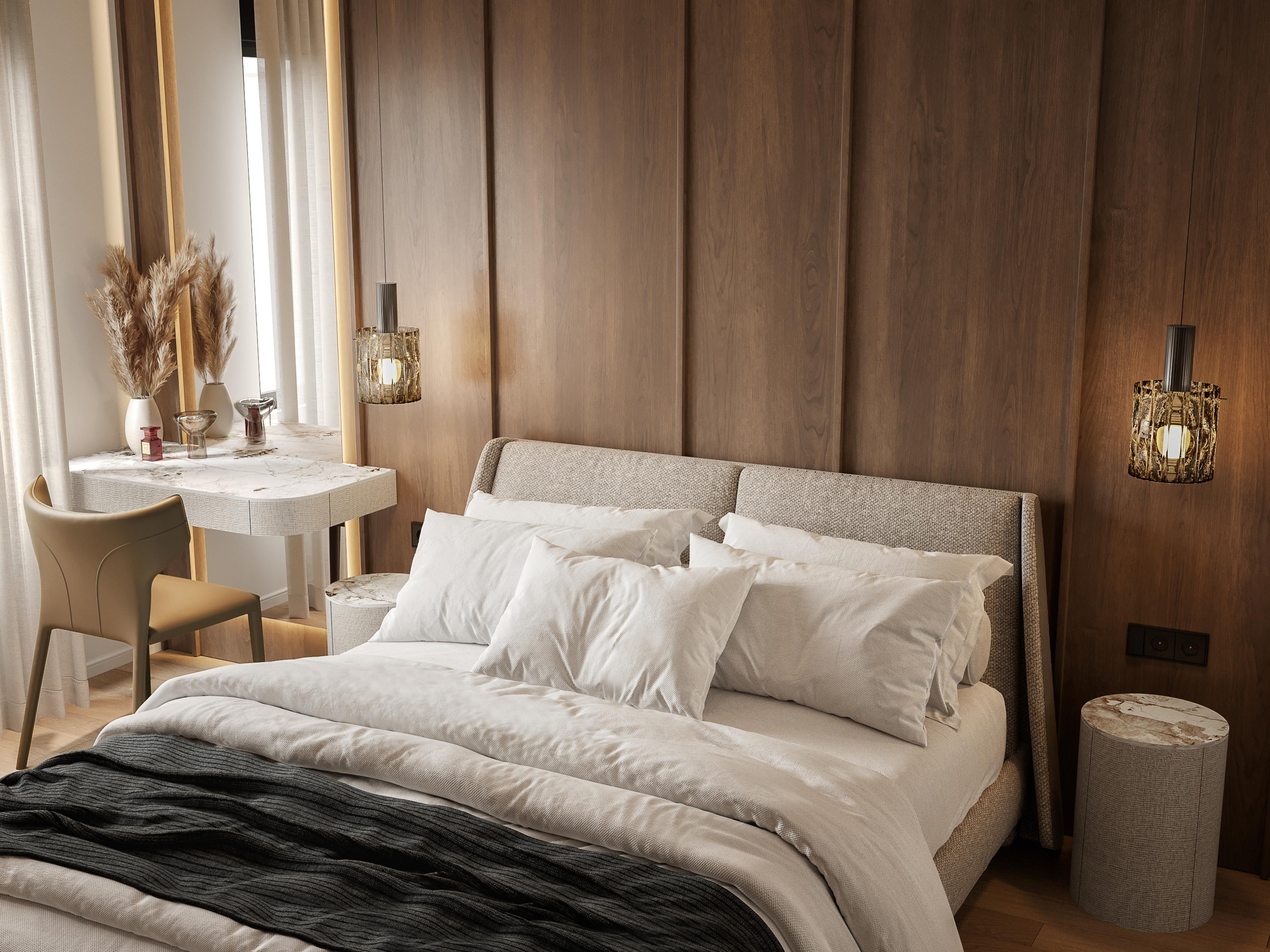 Bed with white linen against a wood panelled wall with rattan wall lights