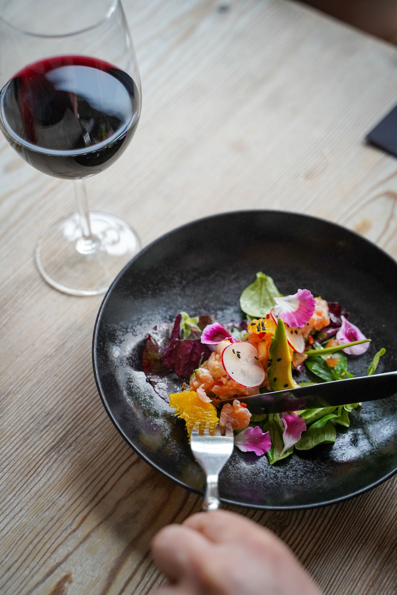 A dish of fish on a plate.
