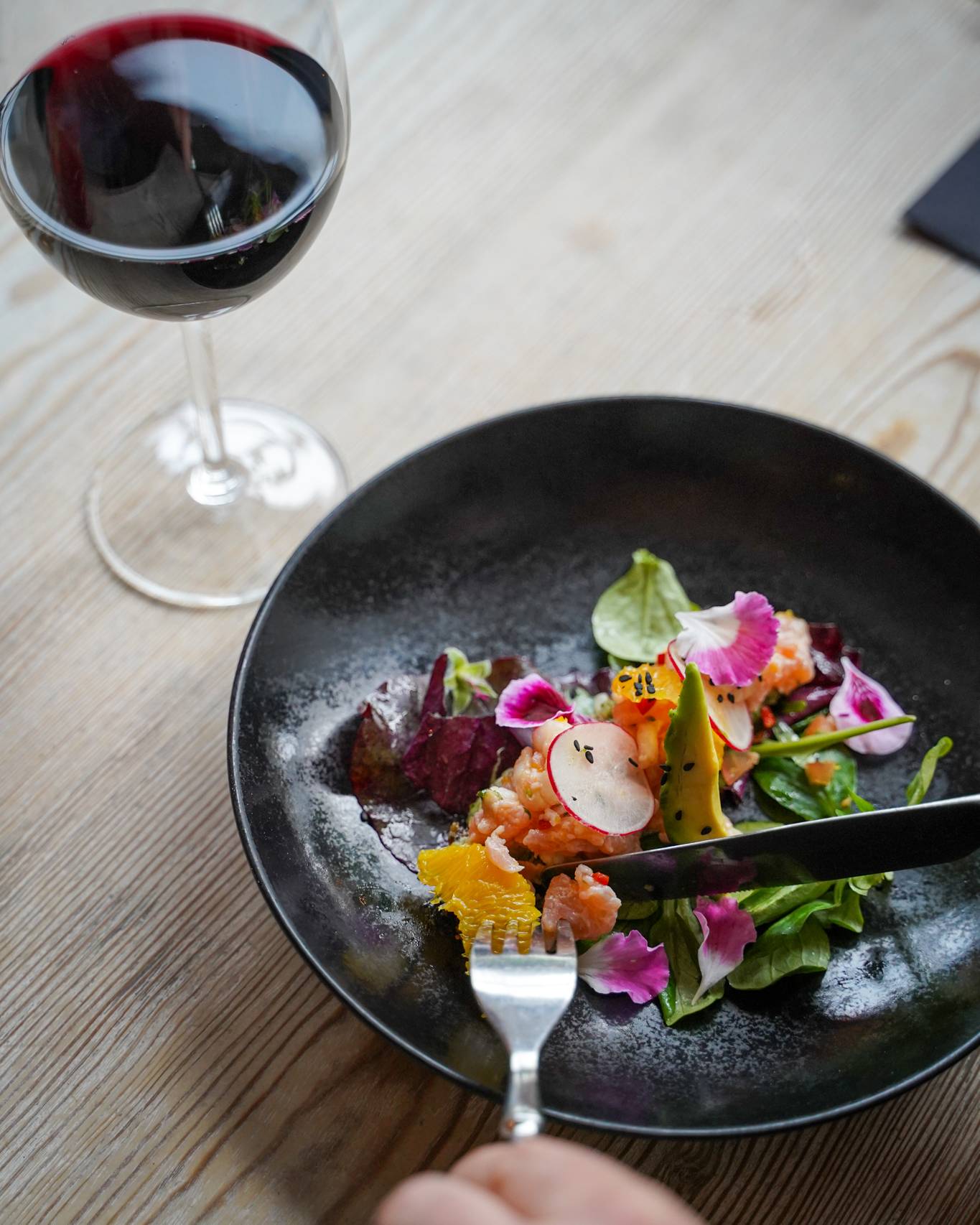 A dish of fish on a plate.