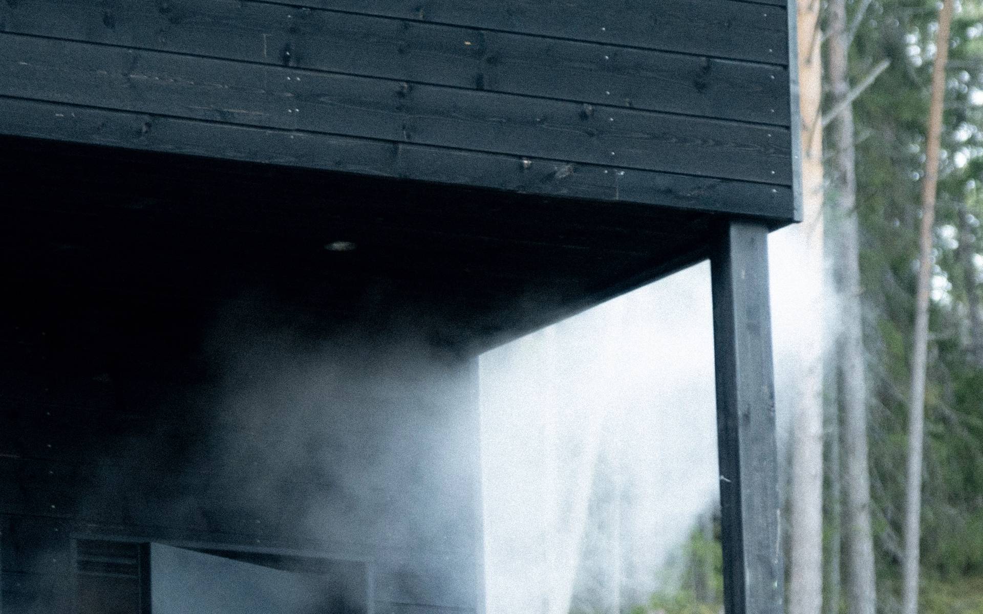 Steam coming out of a wooden sauna
