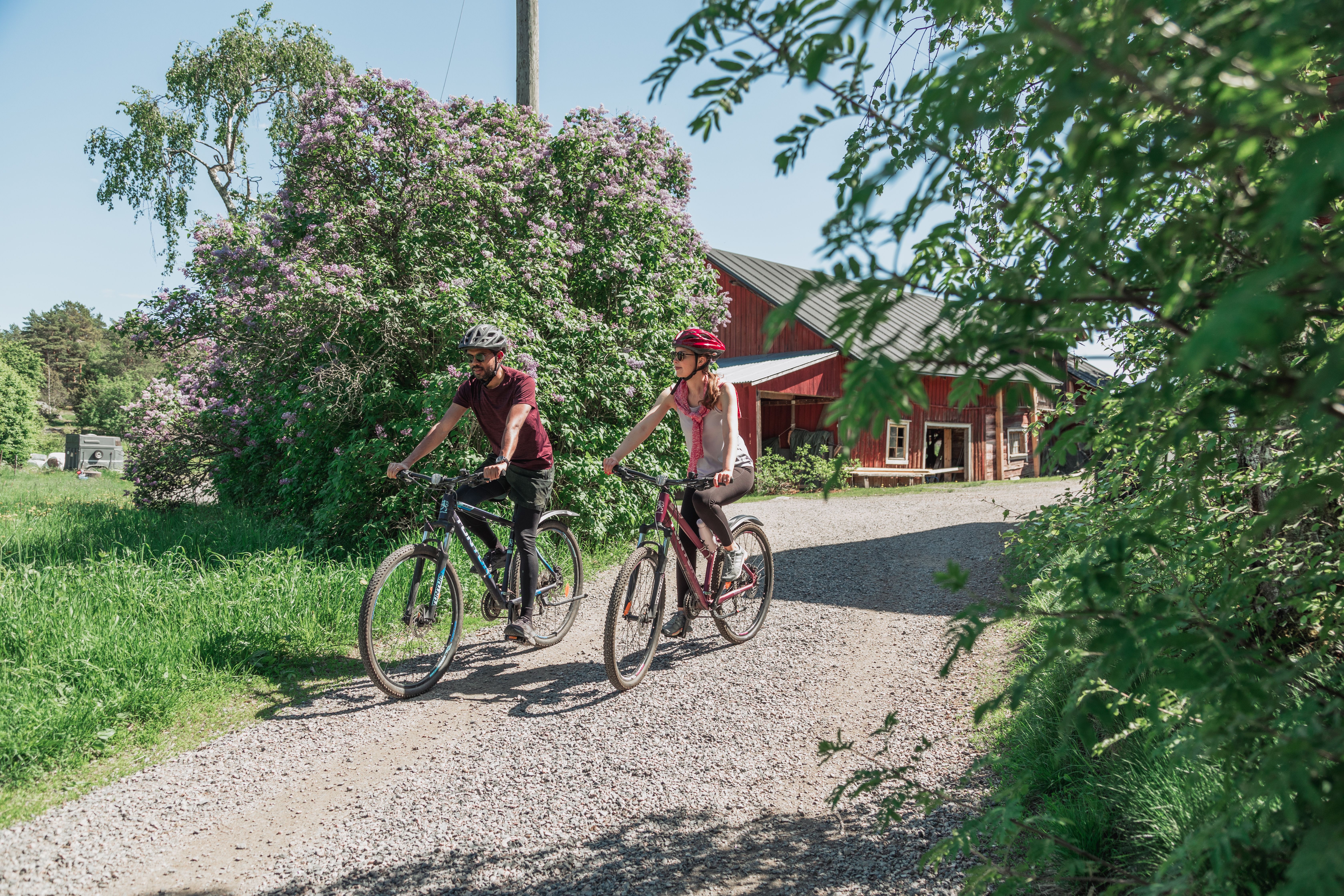 Two people biking