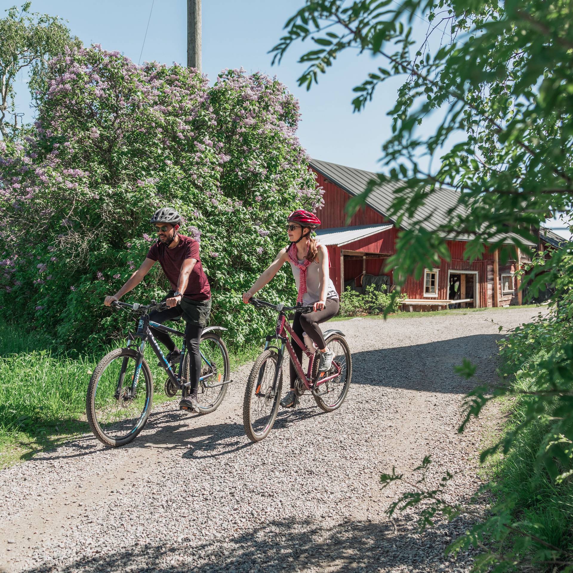 Two people biking