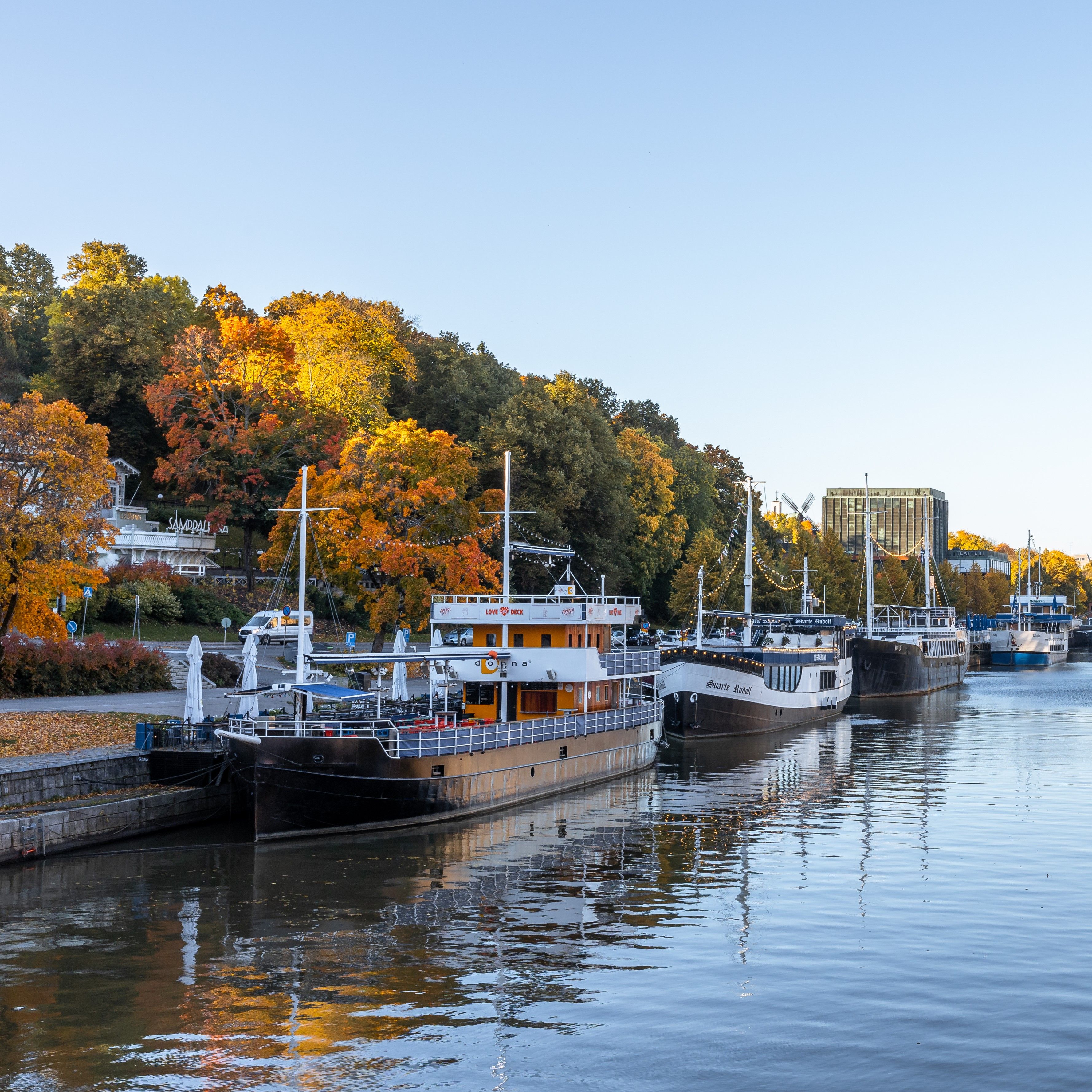 Floating bars parked at the Aura River in Turku
