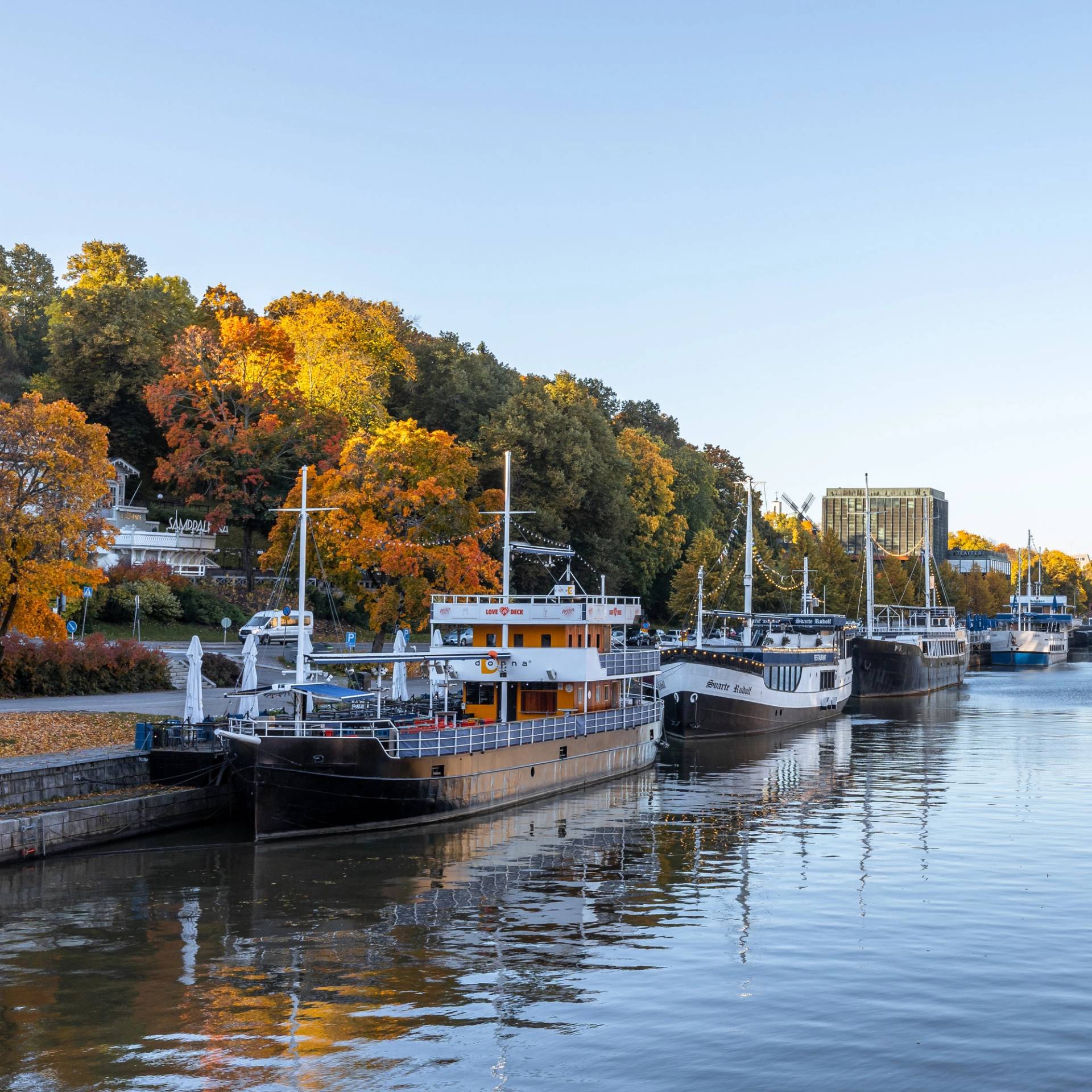 Floating bars parked at the Aura River in Turku
