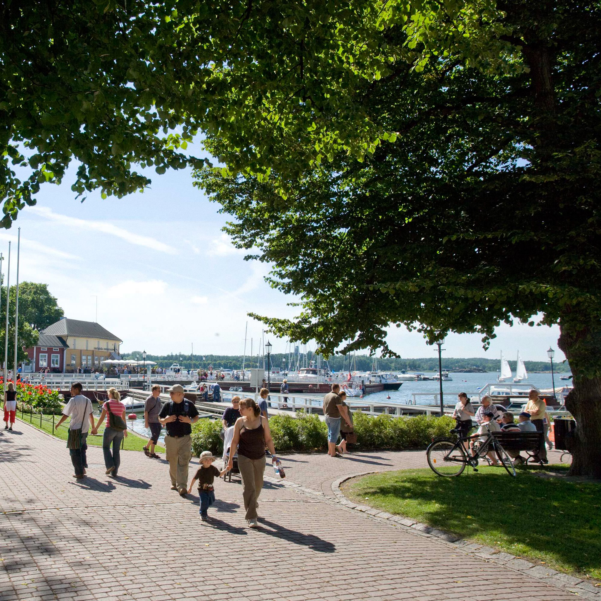 People walking at the Naantali guest harbour.