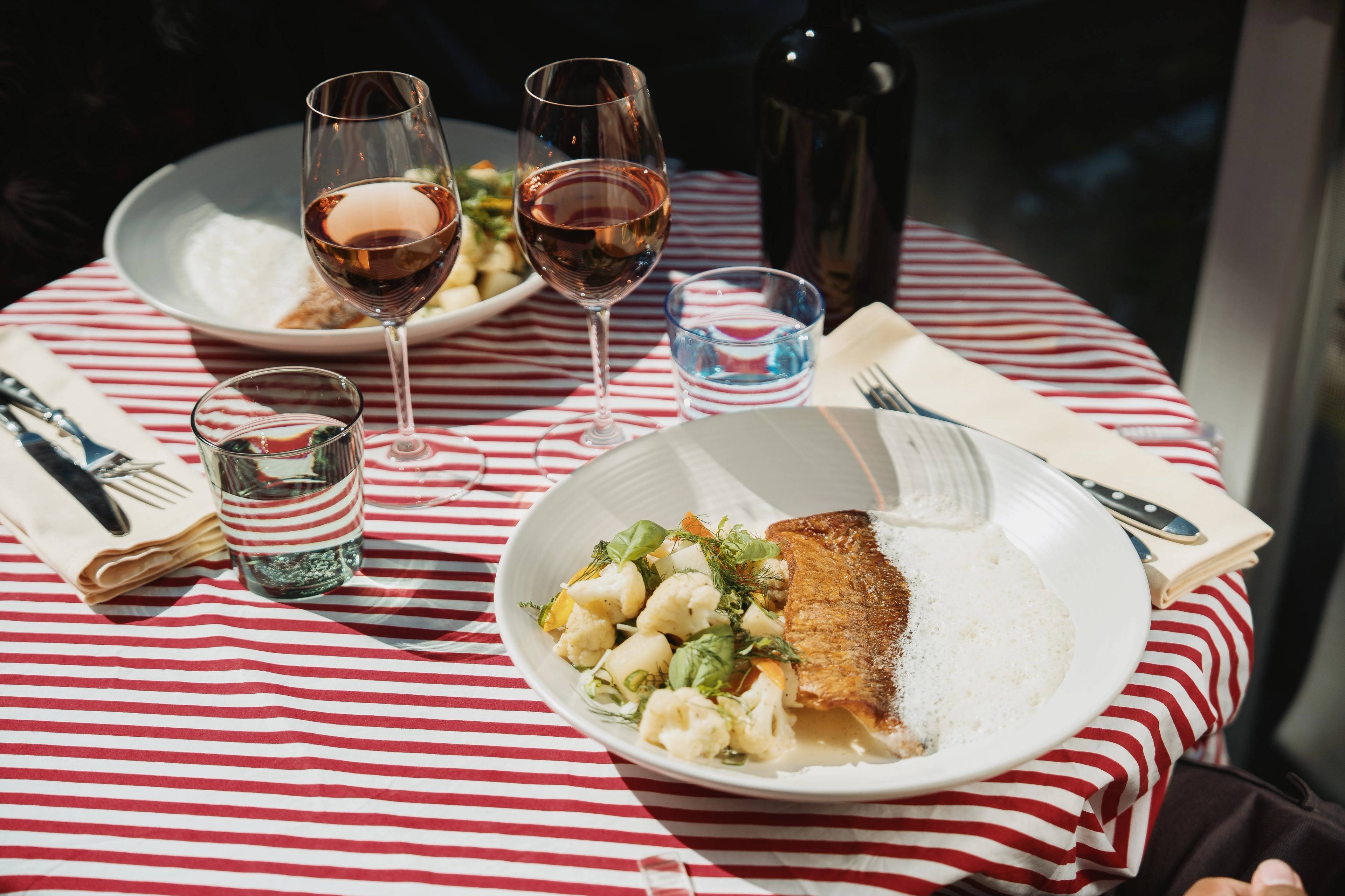 A dish of fish on a plate.