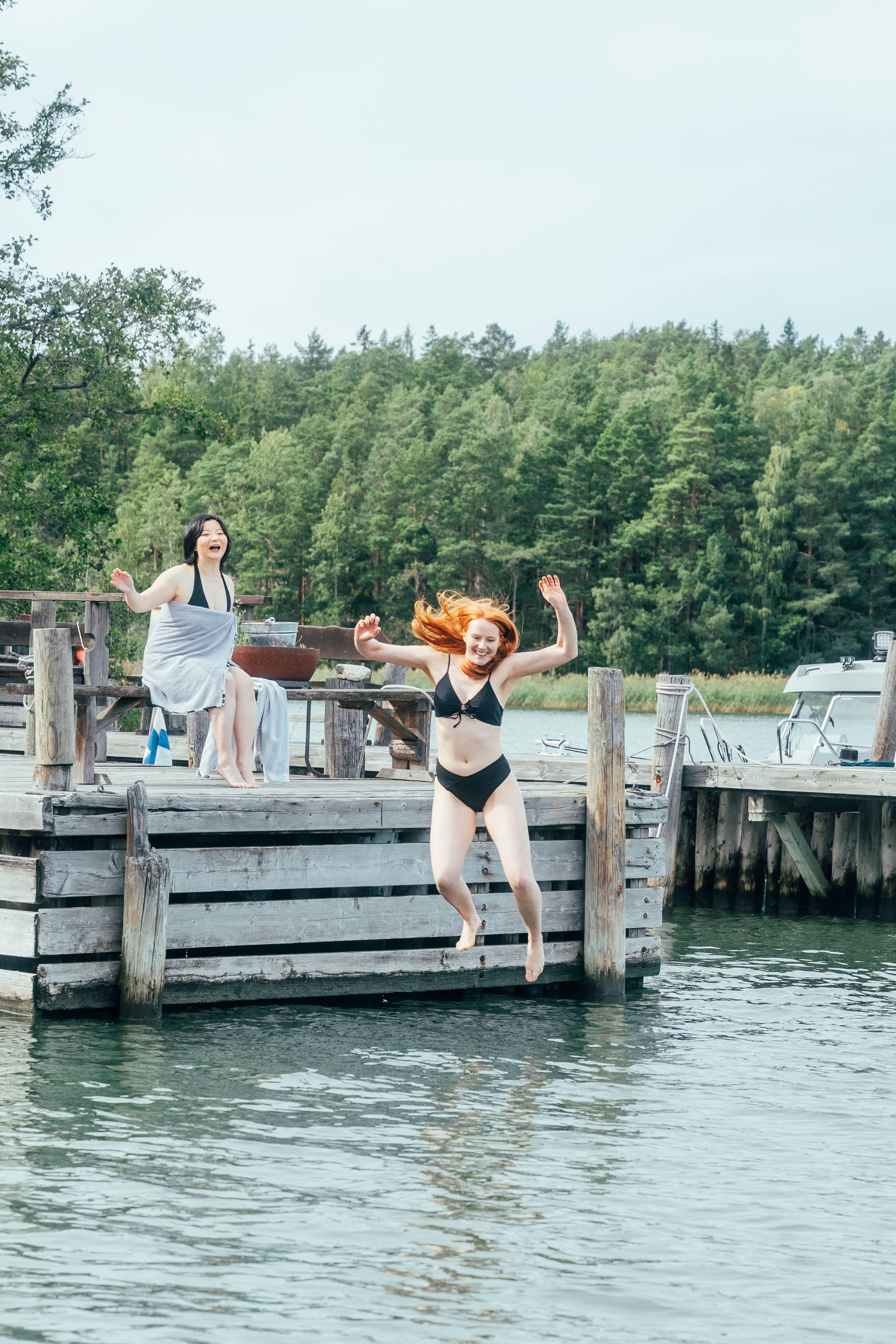 Two women swimming in Rymättylä.
