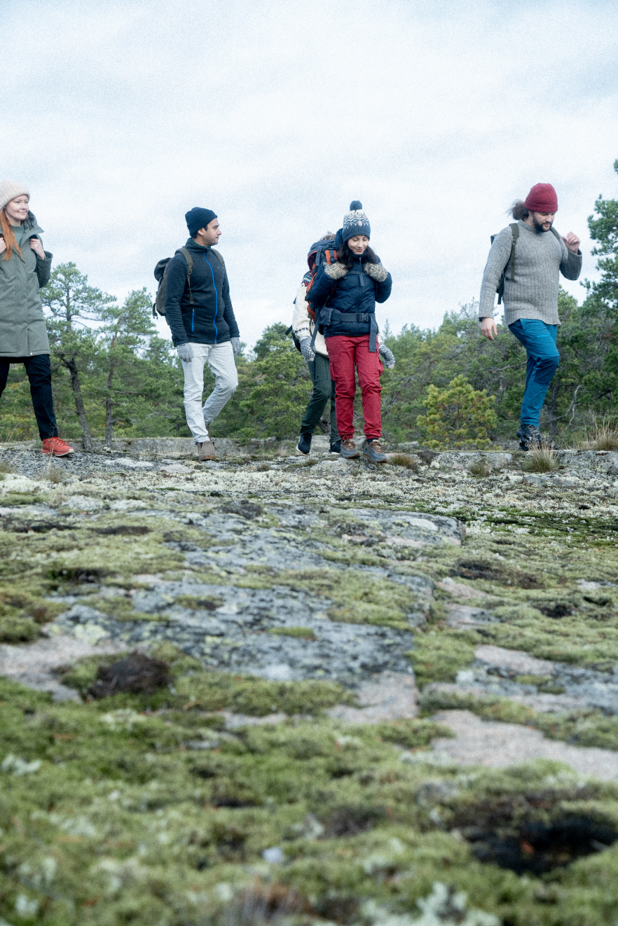 People hiking in a Finnish landscape