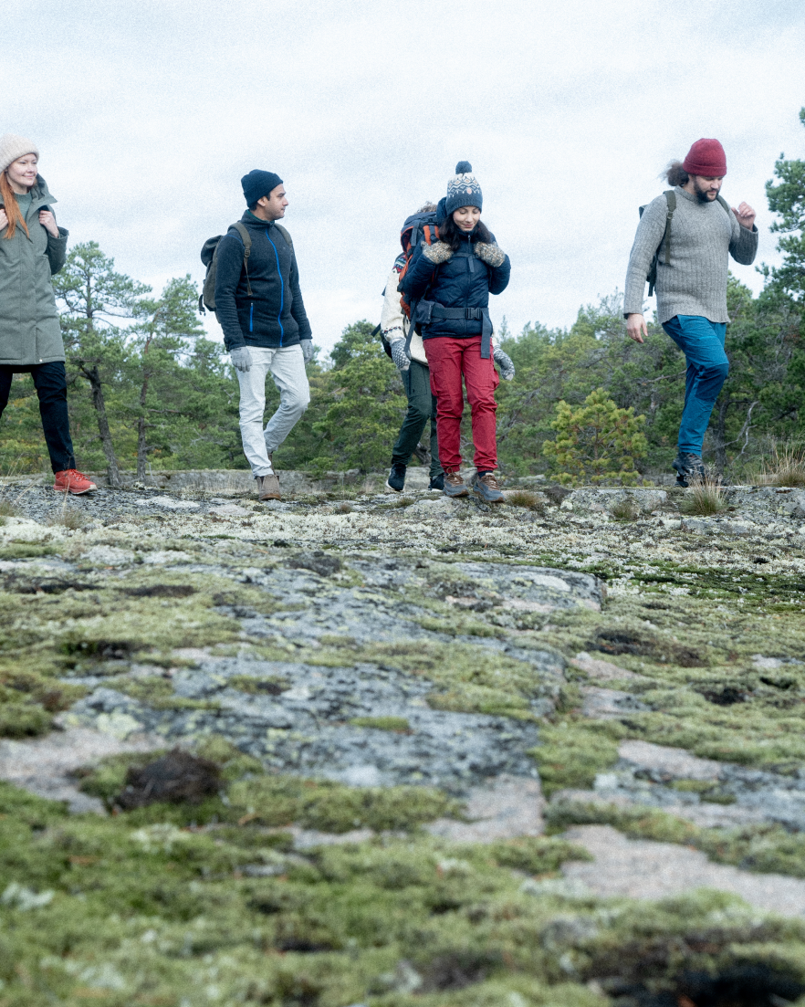 People hiking in a Finnish landscape