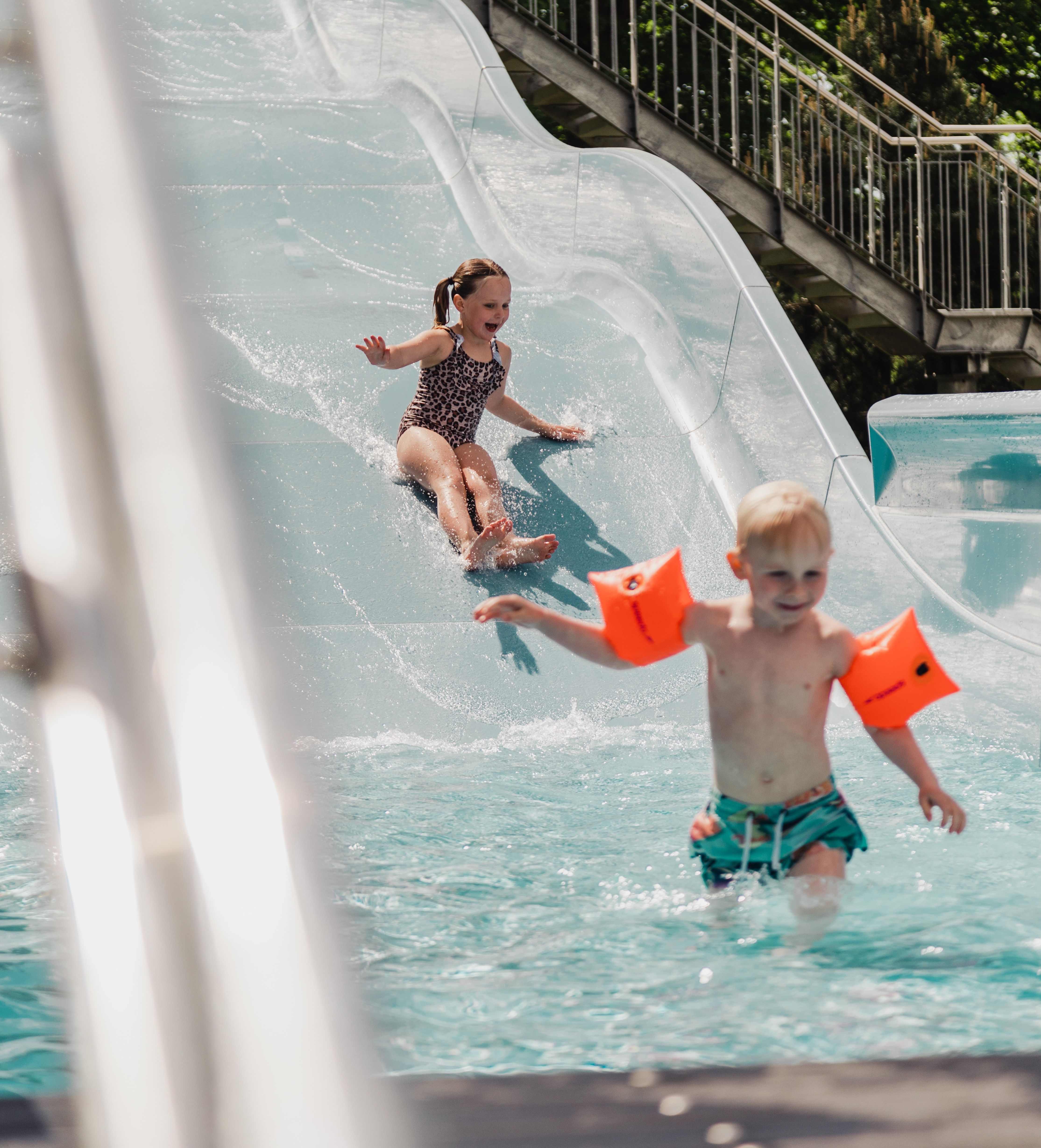Children on a waterslide.