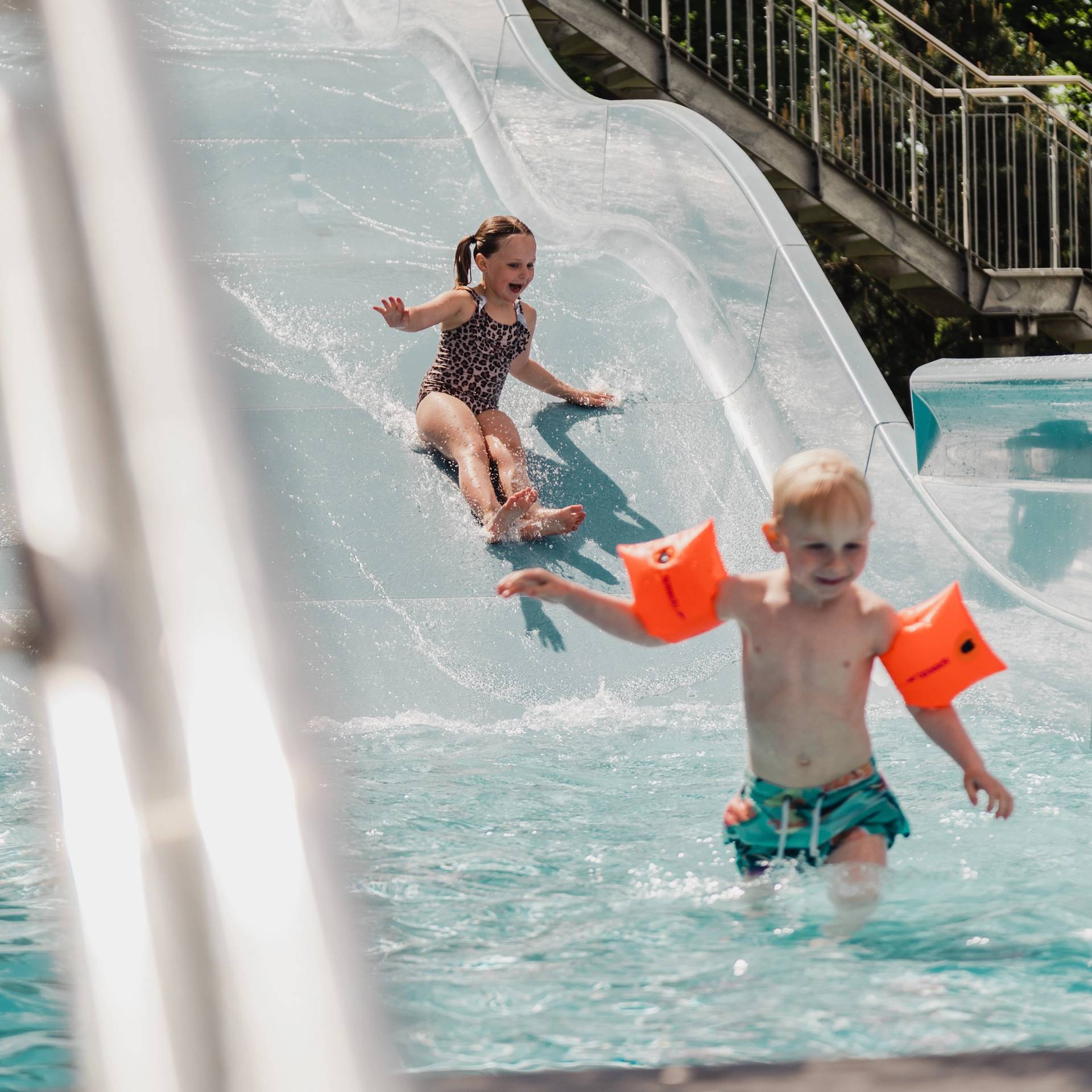 Children on a waterslide.