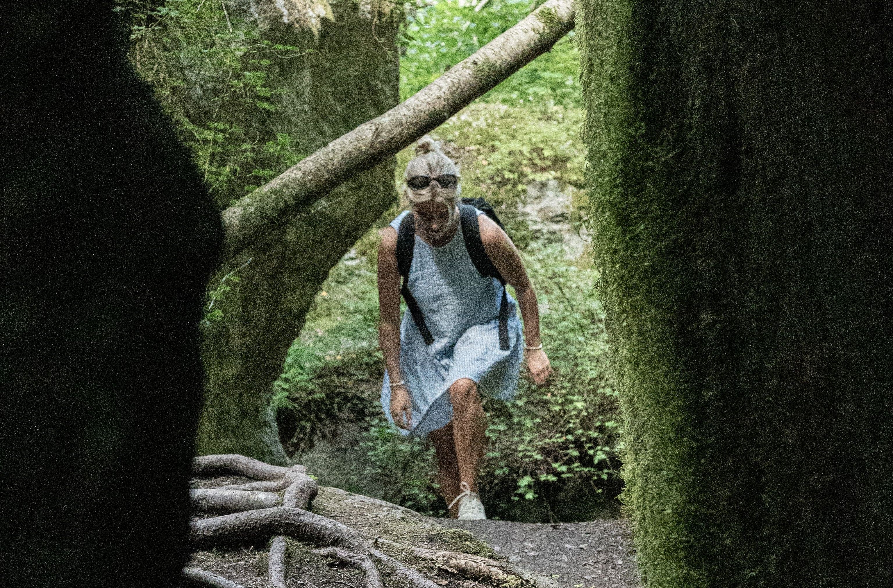 A woman hiking in the archipelago forest