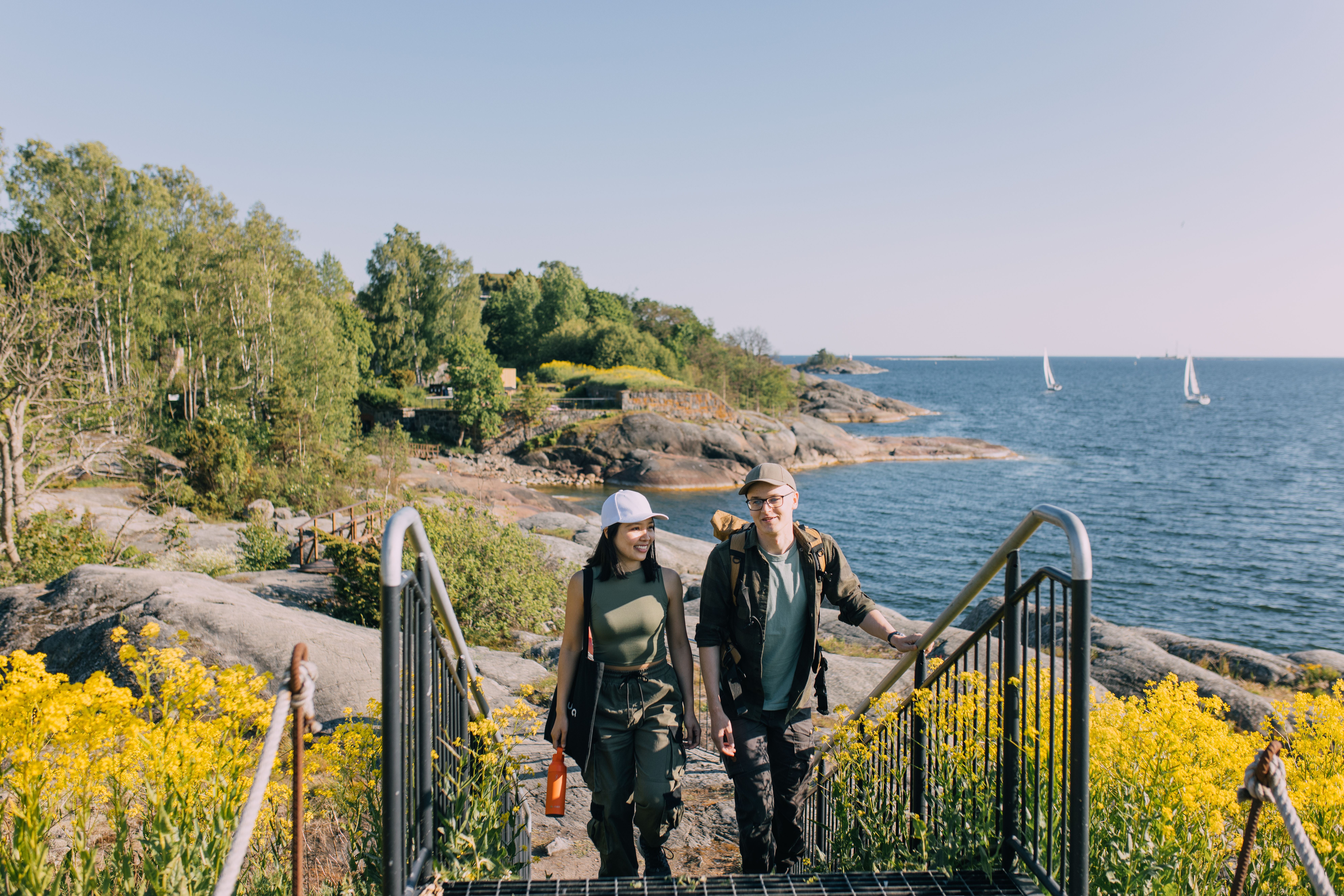 People  walking in the Helsinki archipelago.