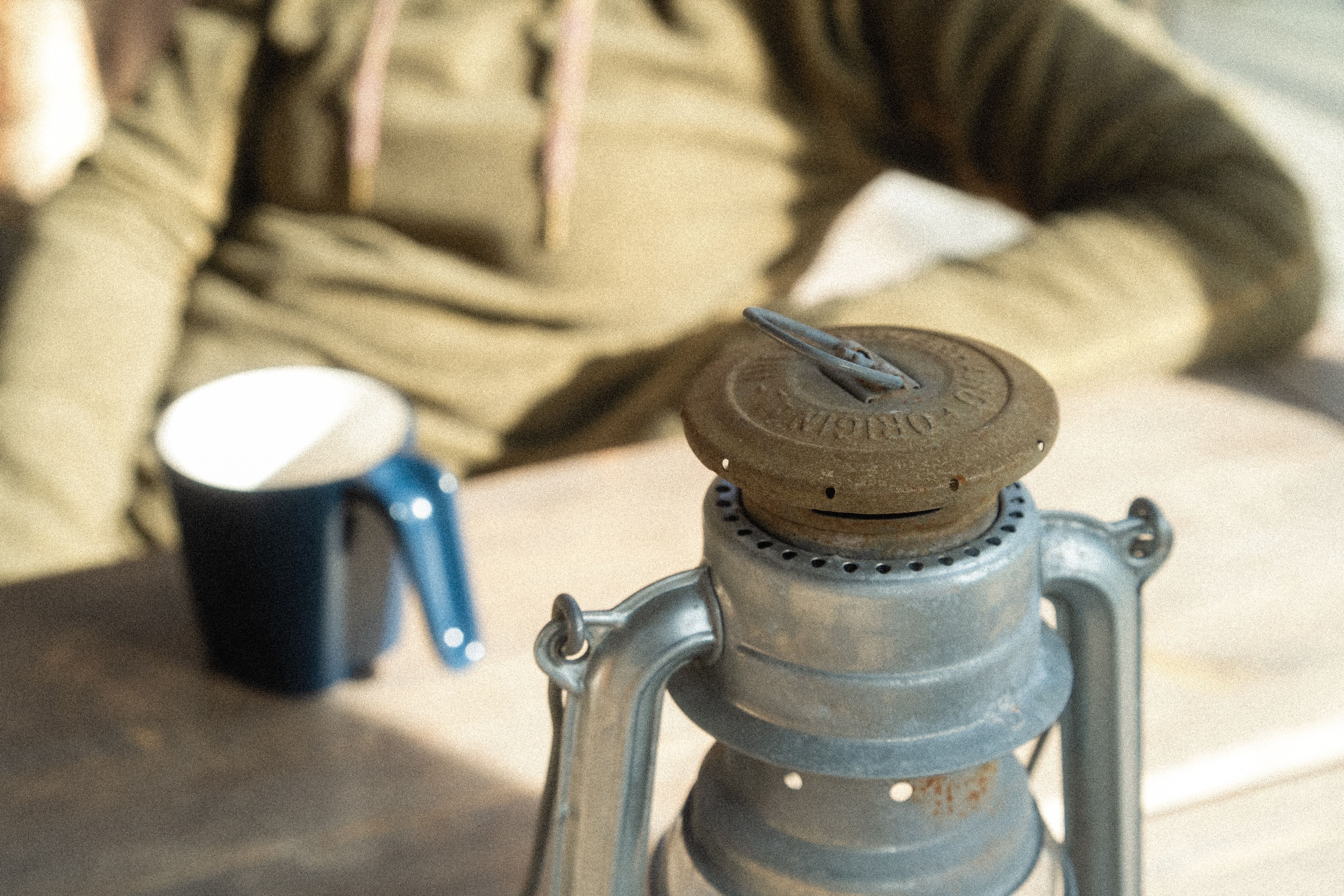 A coffee pot on the table.