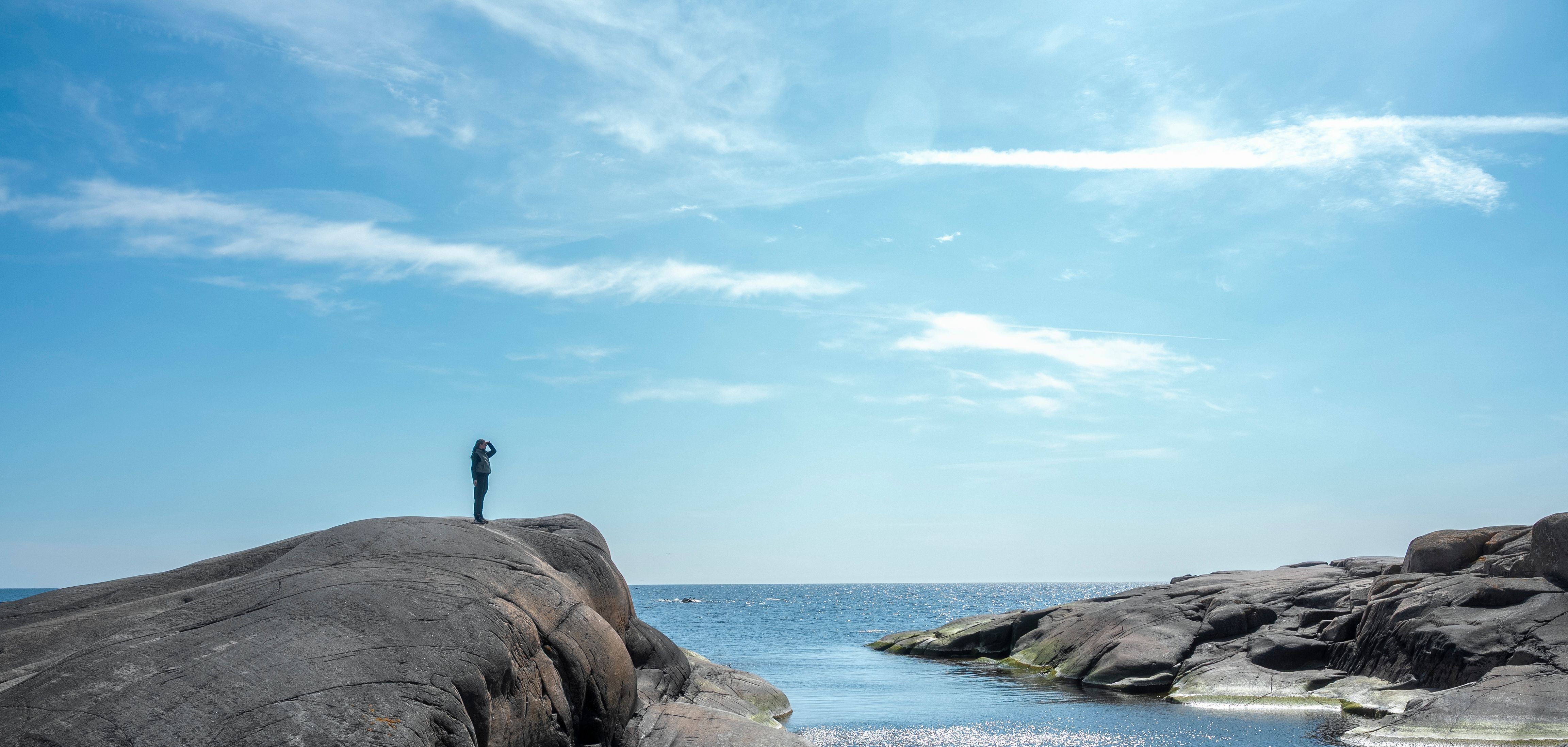 A person looking out to sea in the Finnish archipelago