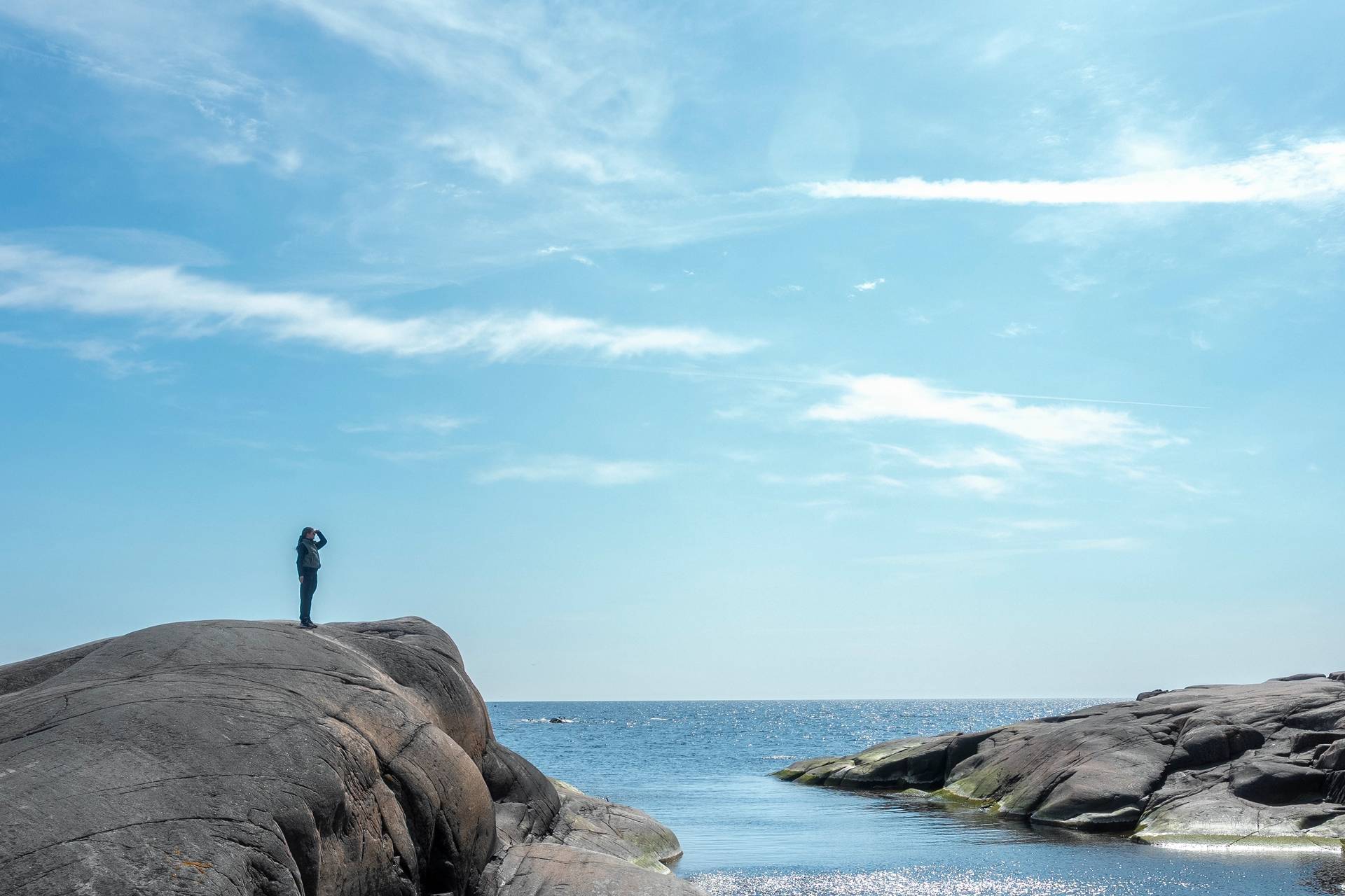 A person looking out to sea in the Finnish archipelago