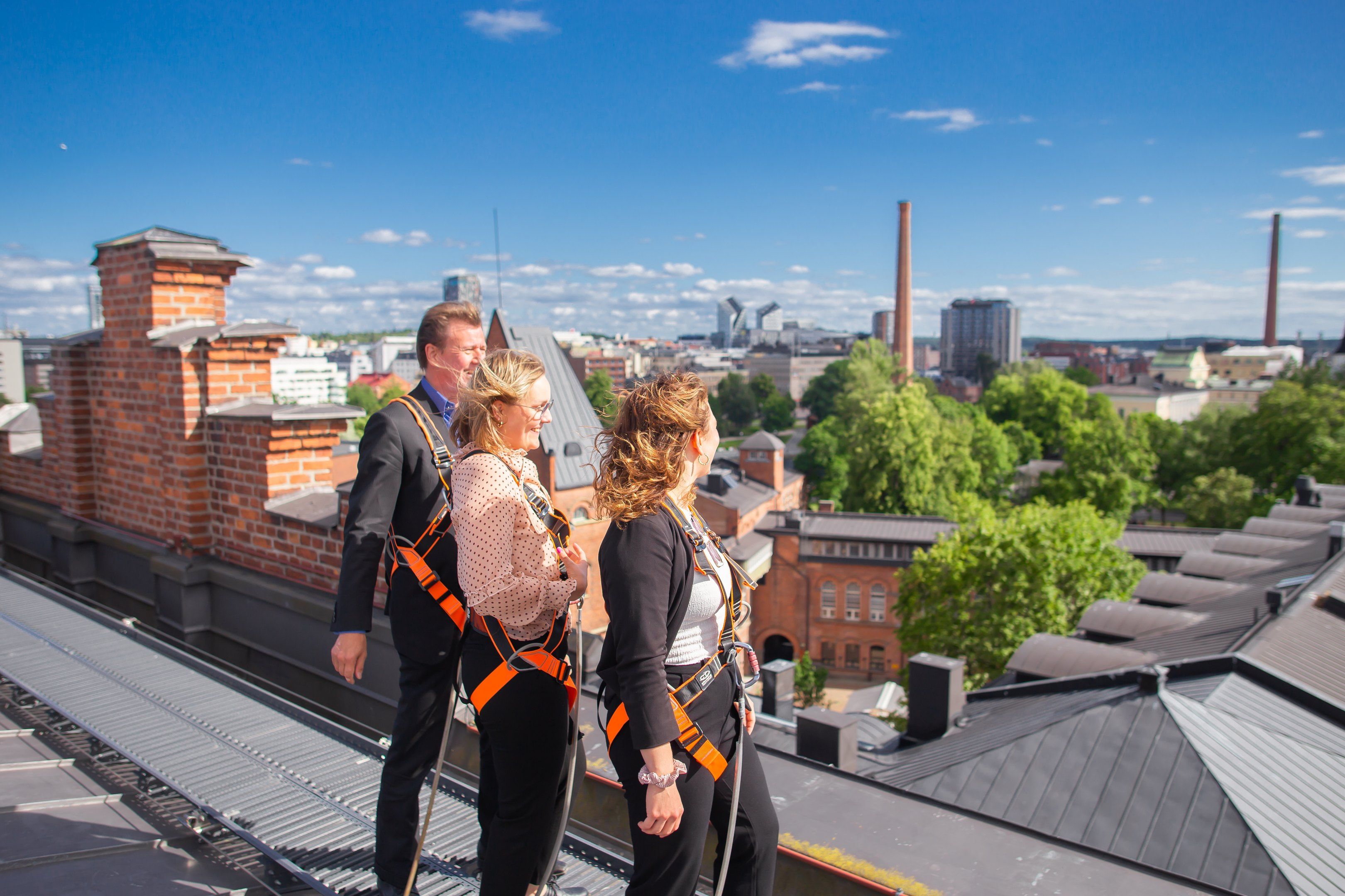 People admiring the Tampere city skyline.