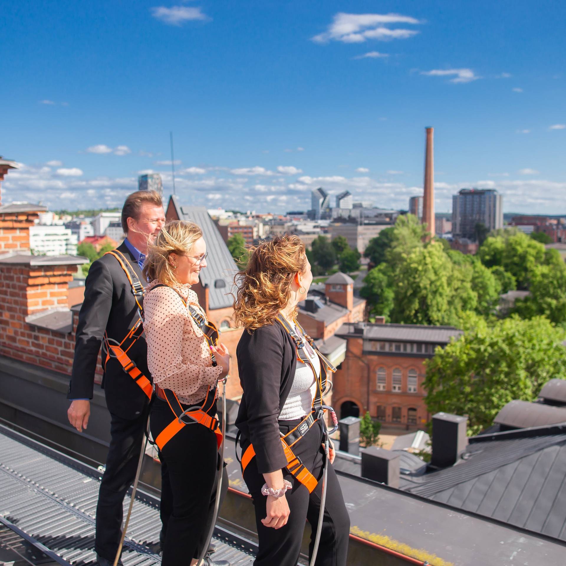 People admiring the Tampere city skyline.