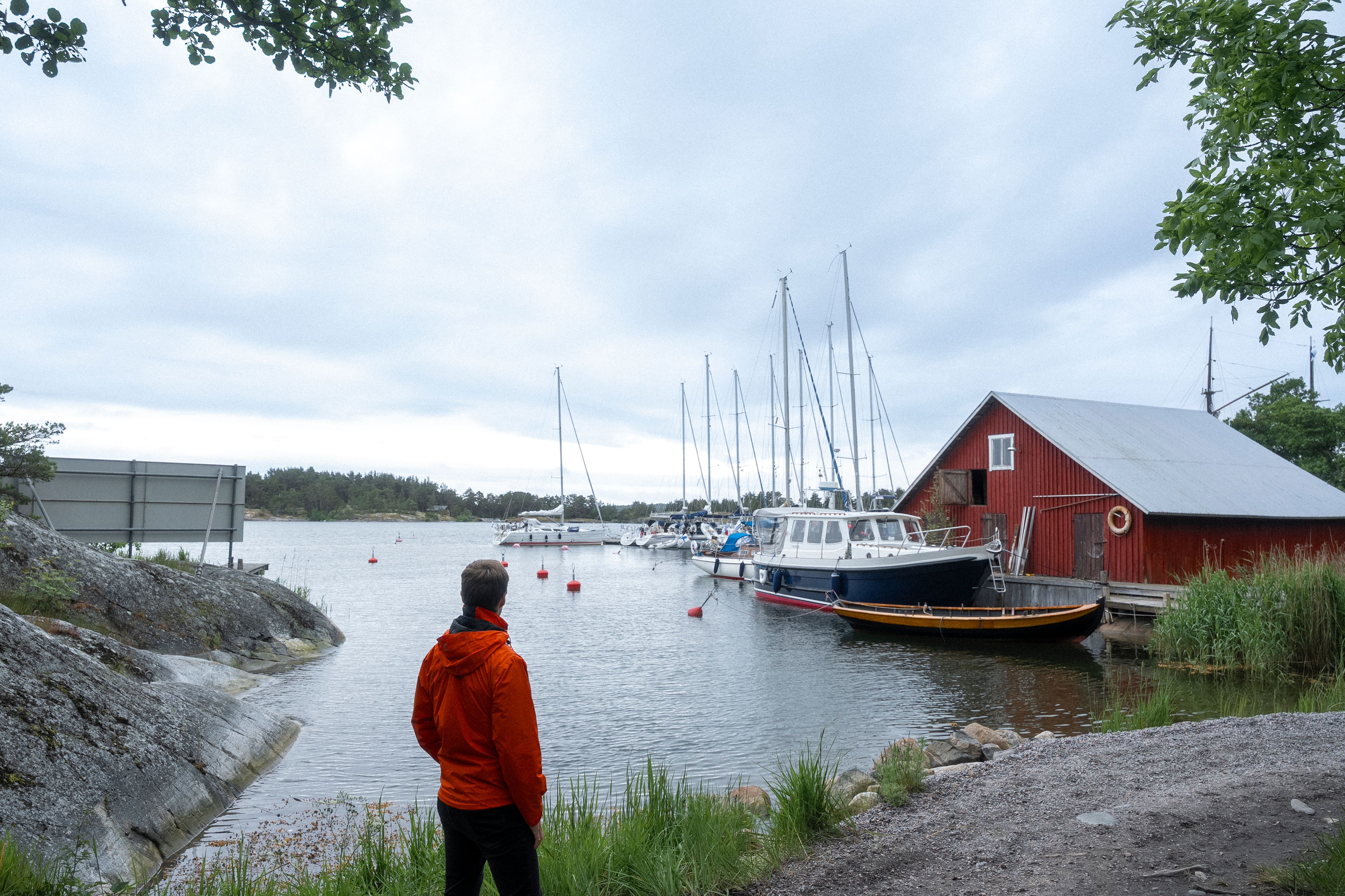 A person standing on the shore of Brännskär.