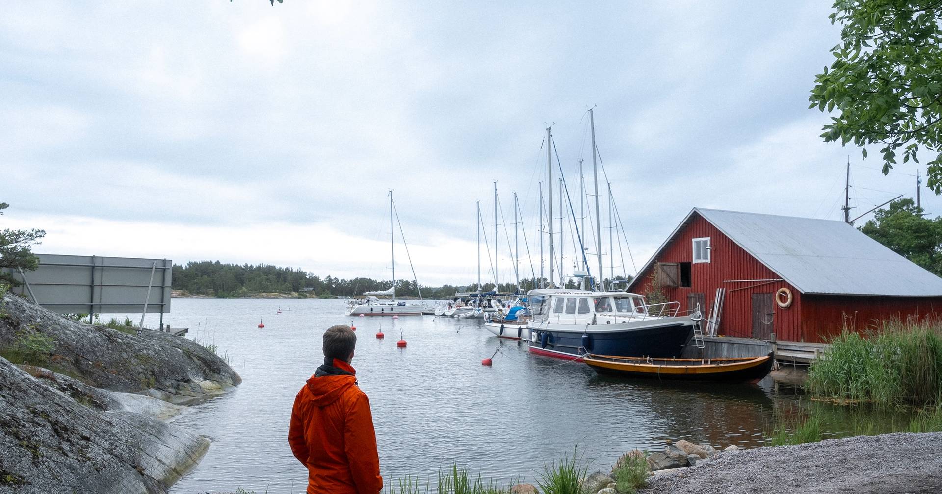 A person standing on the shore of Brännskär.