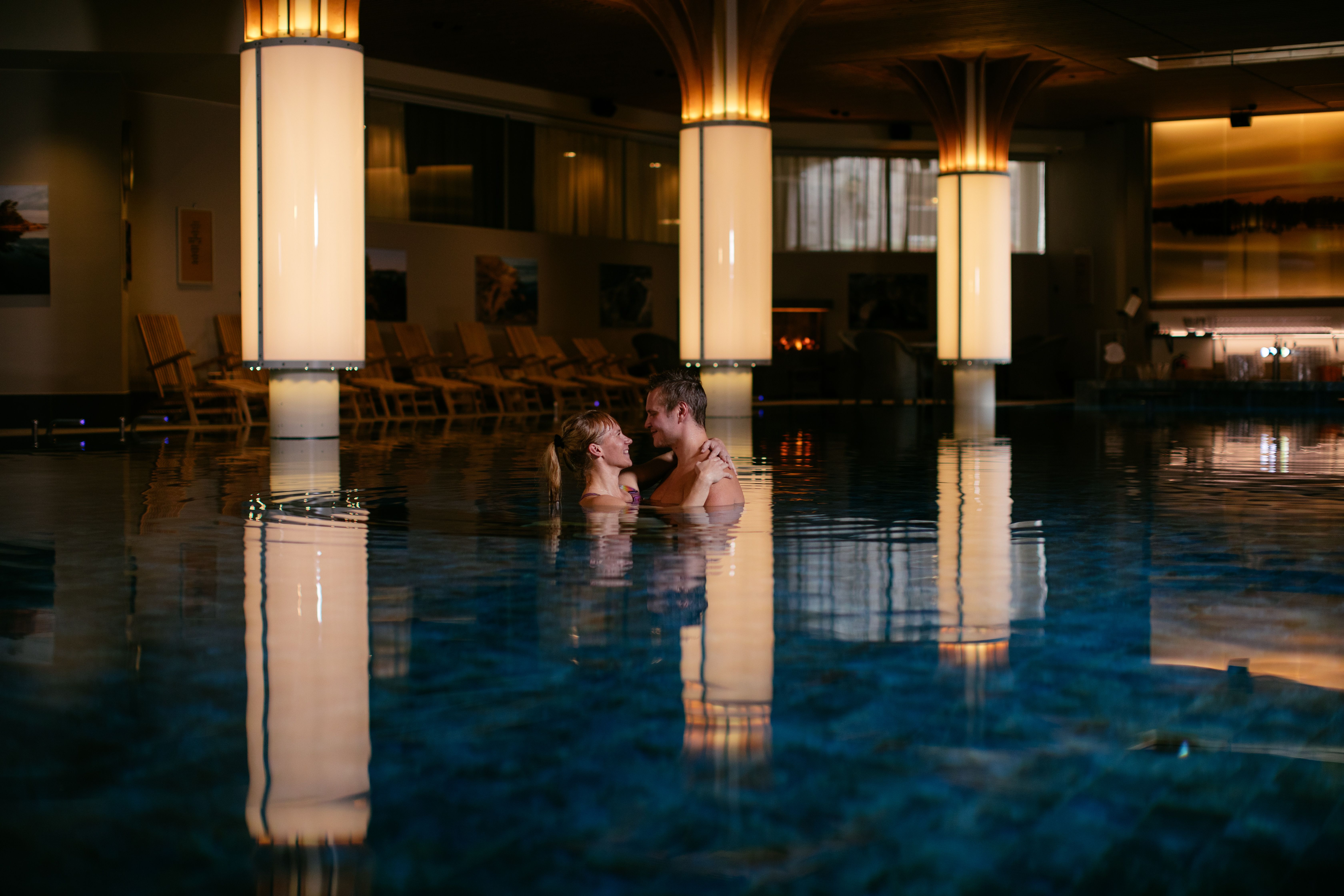 A couple in a pool.