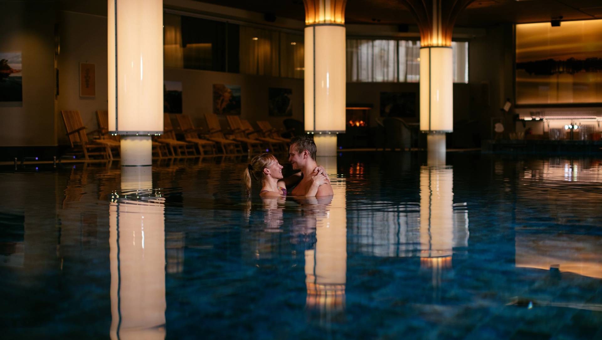 A couple in a pool.
