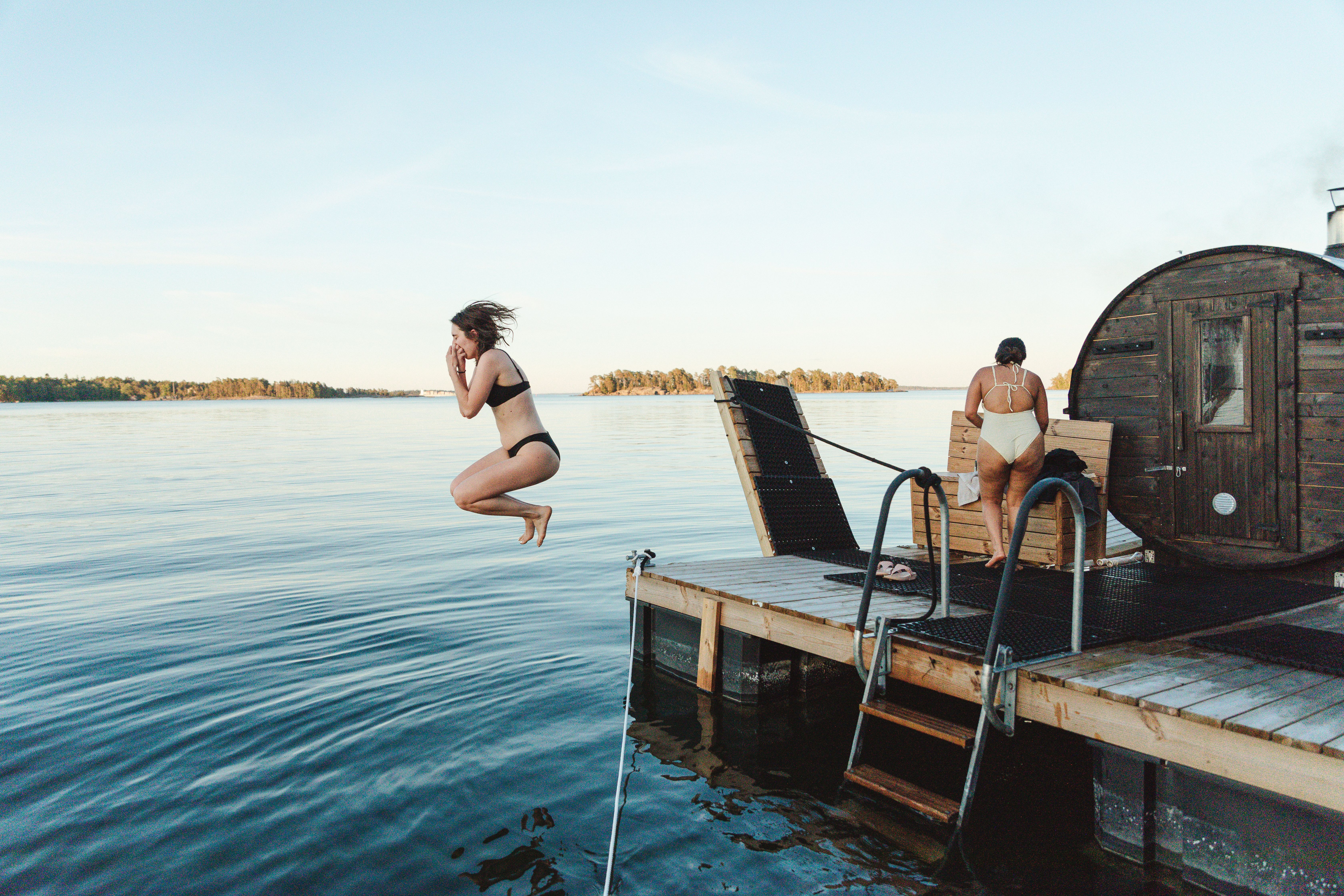 People swimming after a sauna.