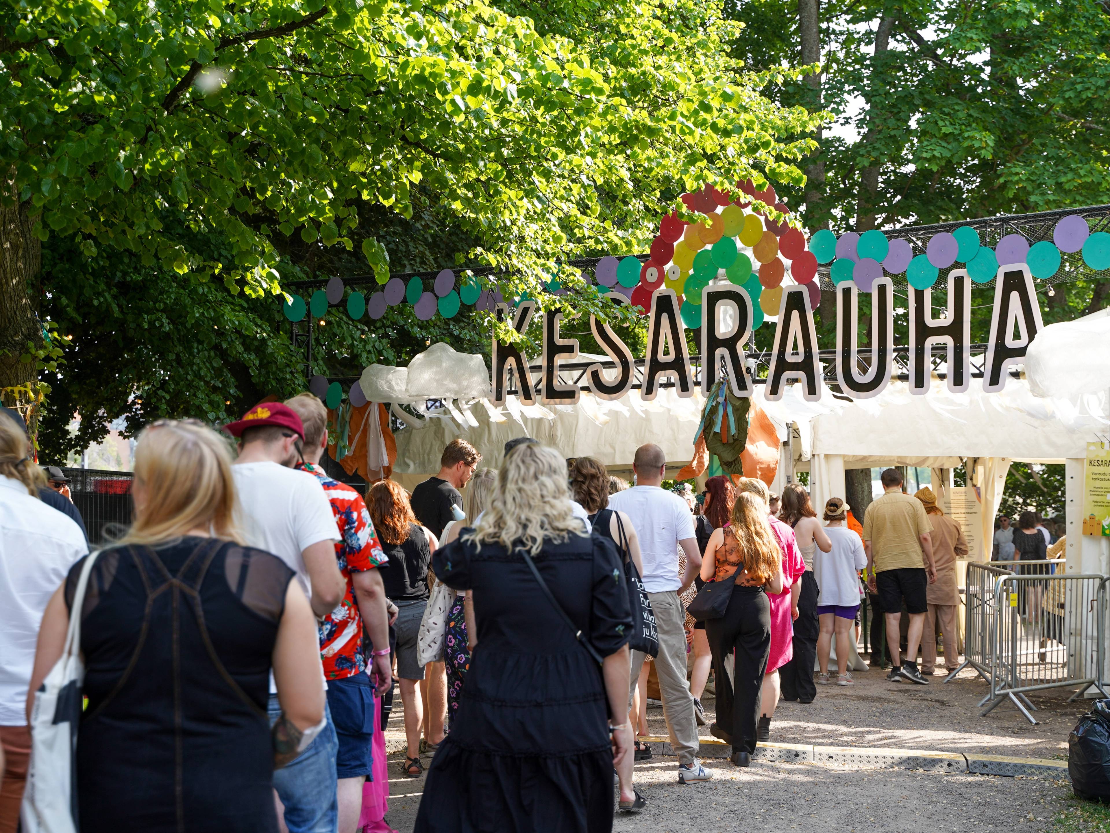 People walking to a festival.