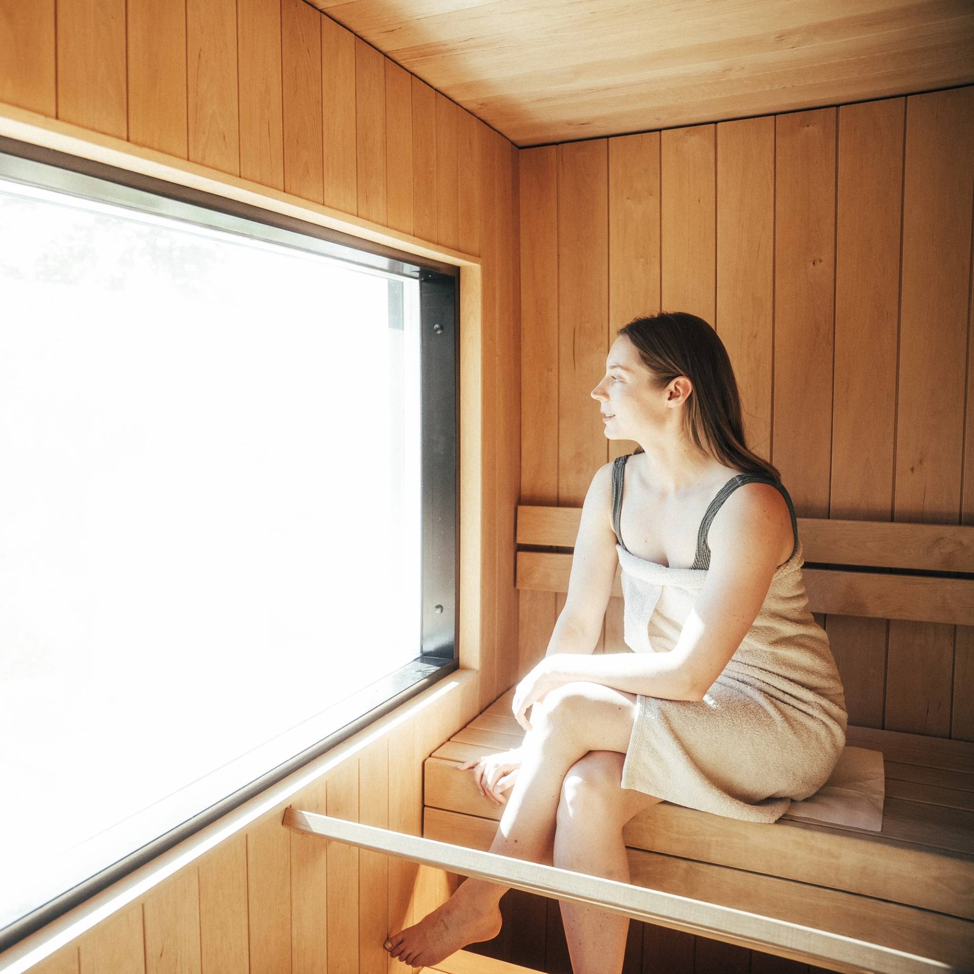 A woman in a finnish sauna in archipelago