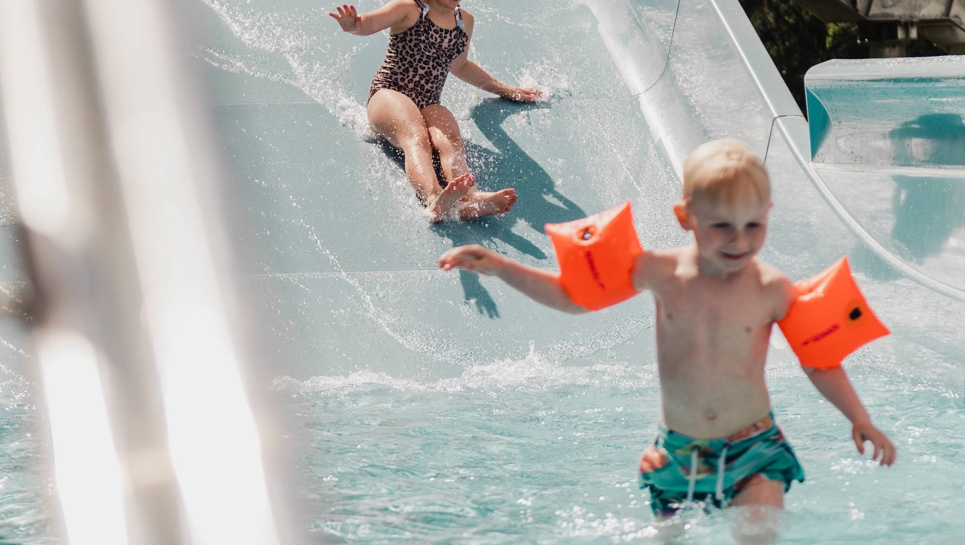 Kids enjoying water park.