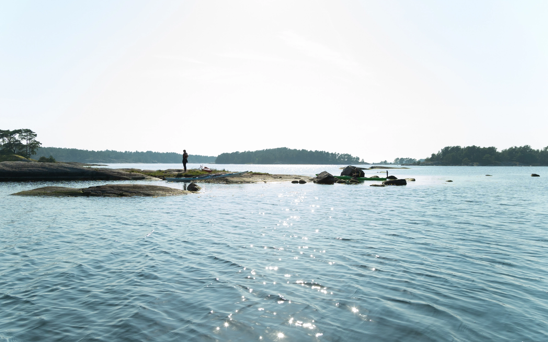 A man standing on the rocks.
