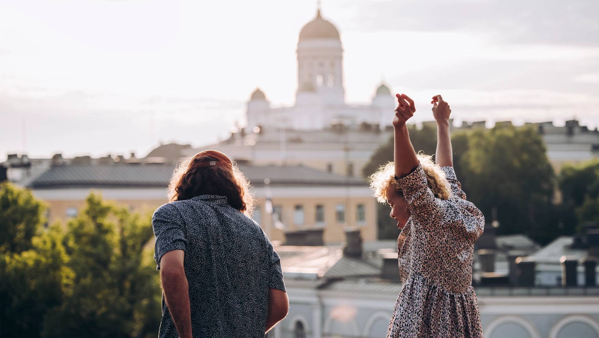 People partying in front of the Helsinki Cathedral.