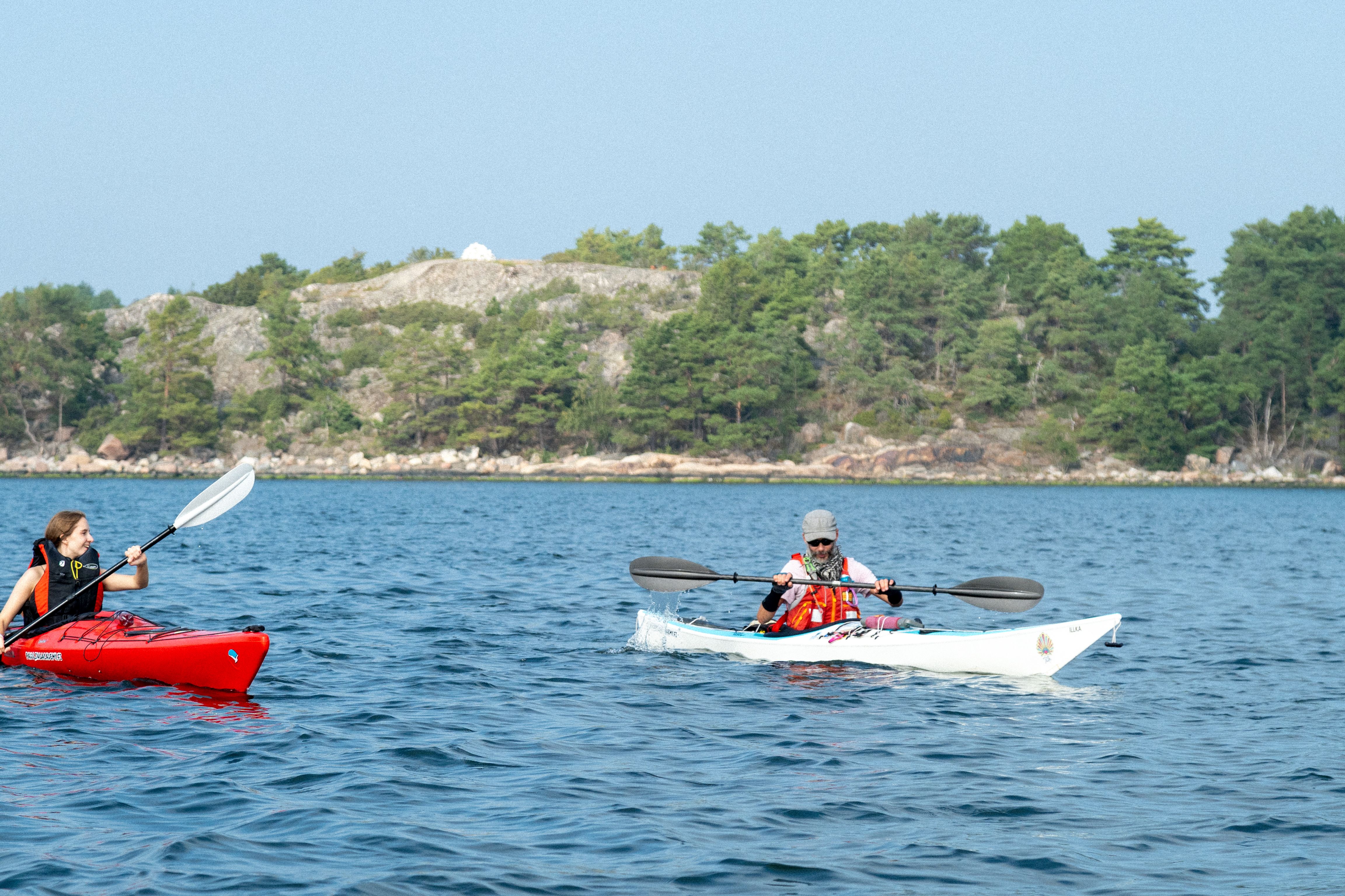 People kayaking.