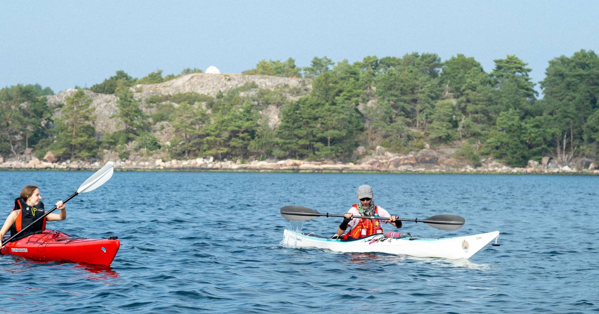 People kayaking.