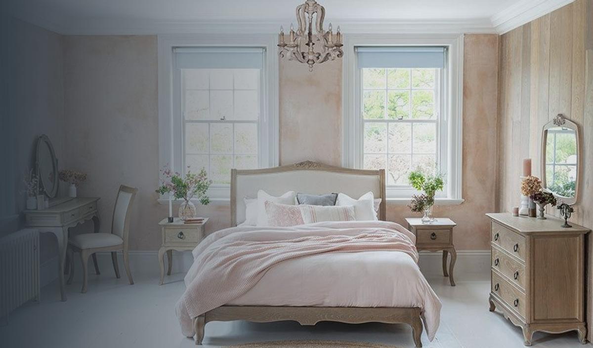 Camille bedroom collection: upholstered bed, bedside lockers and chest in a bright bedroom
