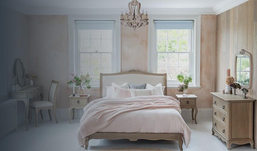 Camille bedroom collection: upholstered bed, bedside lockers and chest in a bright bedroom