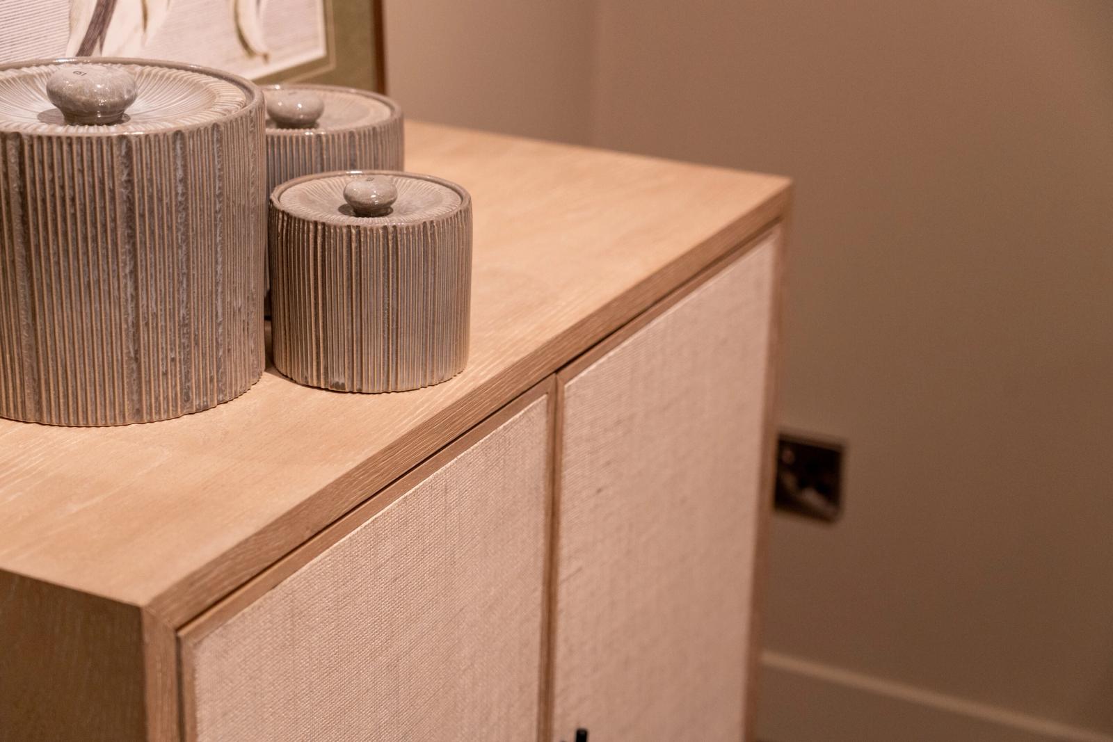 Hooker two-door sideboard, top and grasscloth door