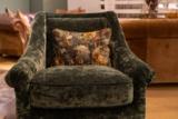 Garbo chair, floor model in green crushed velvet, from the front