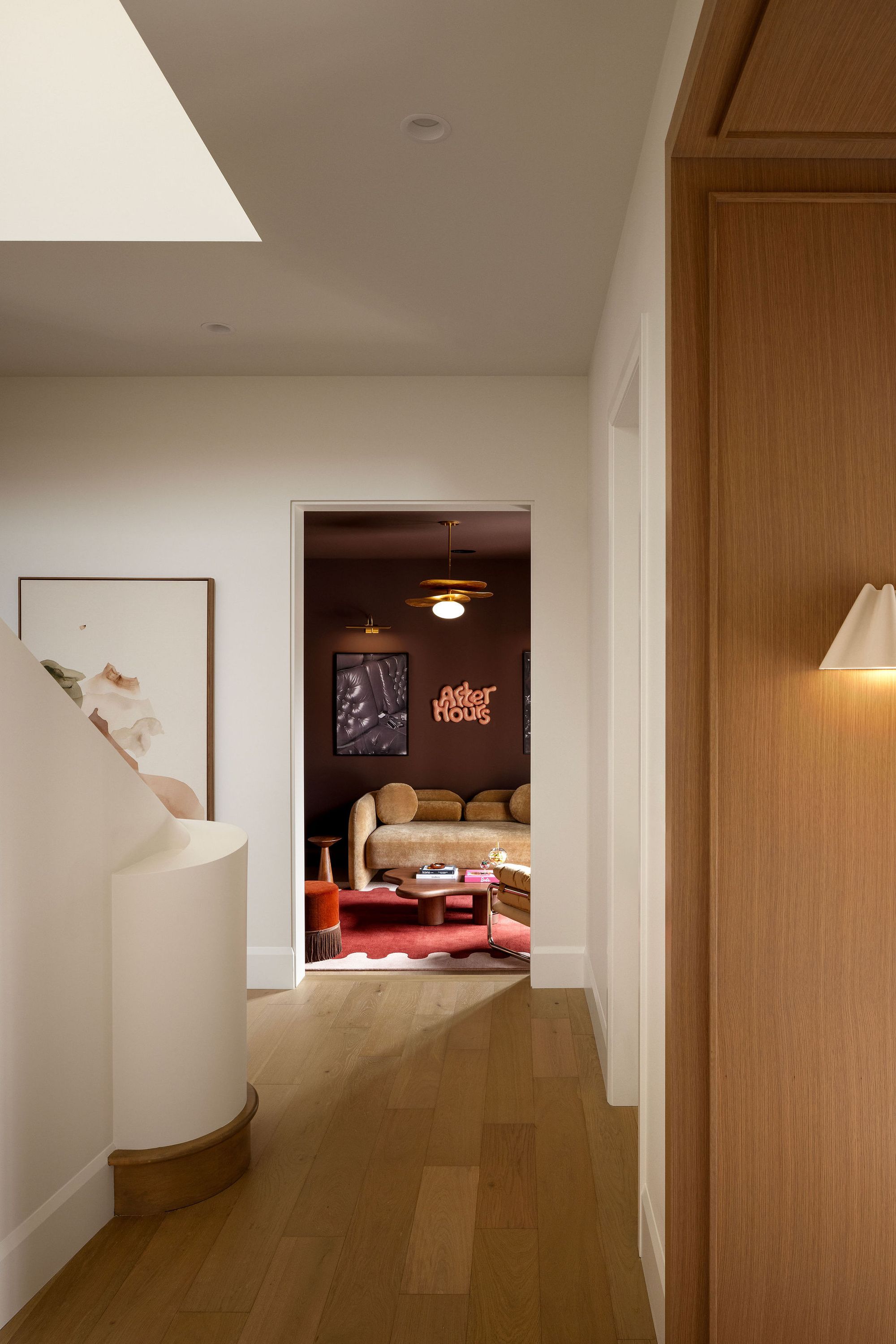 Hallway leading to a lounge in The Charlotte home