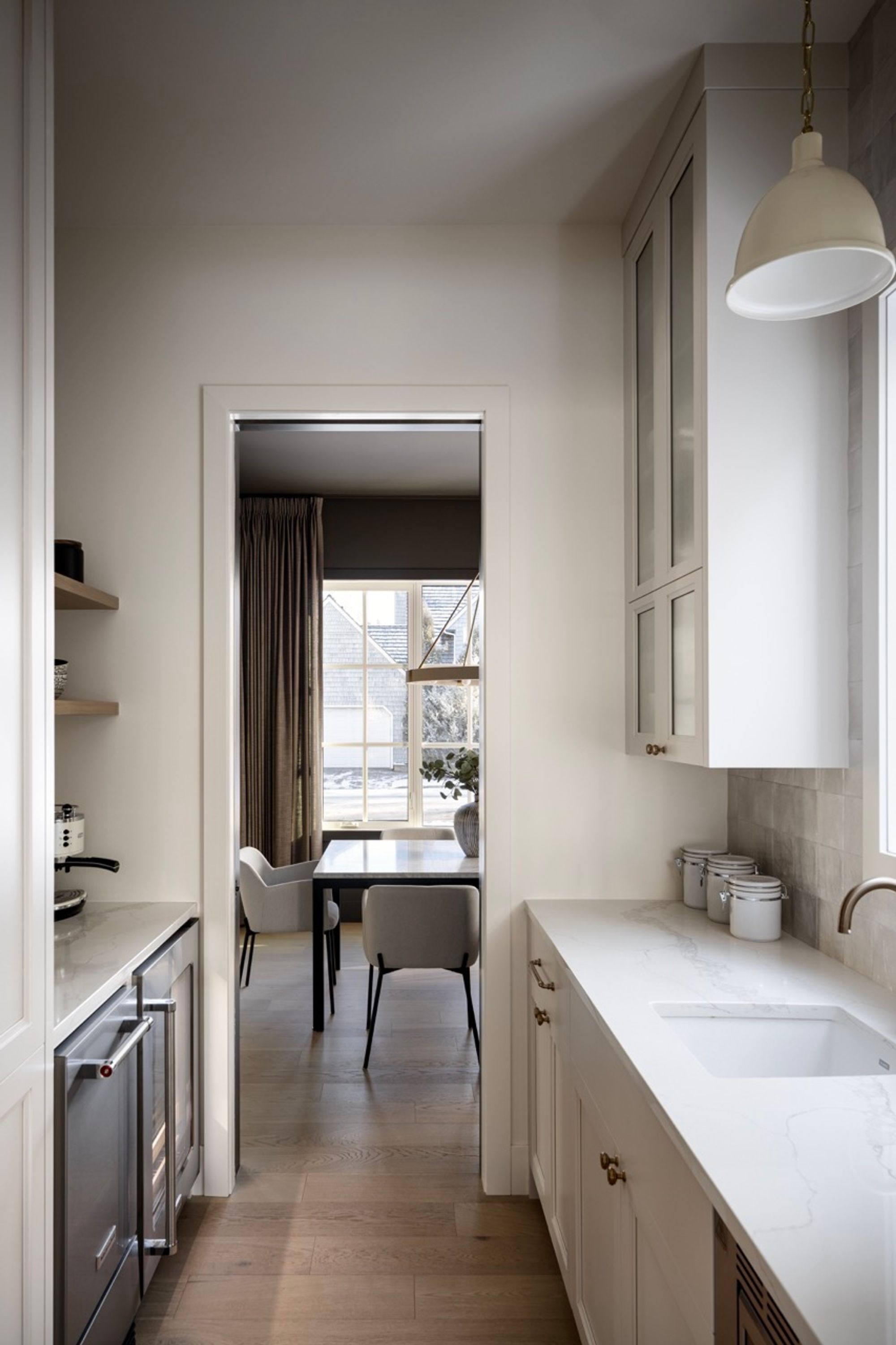 Butler pantry looking through to the dining room in the Riverdale home