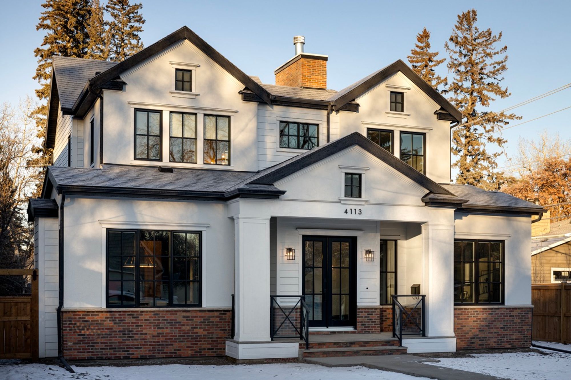 Front exterior with brick base and covered porch in the Riverdale home