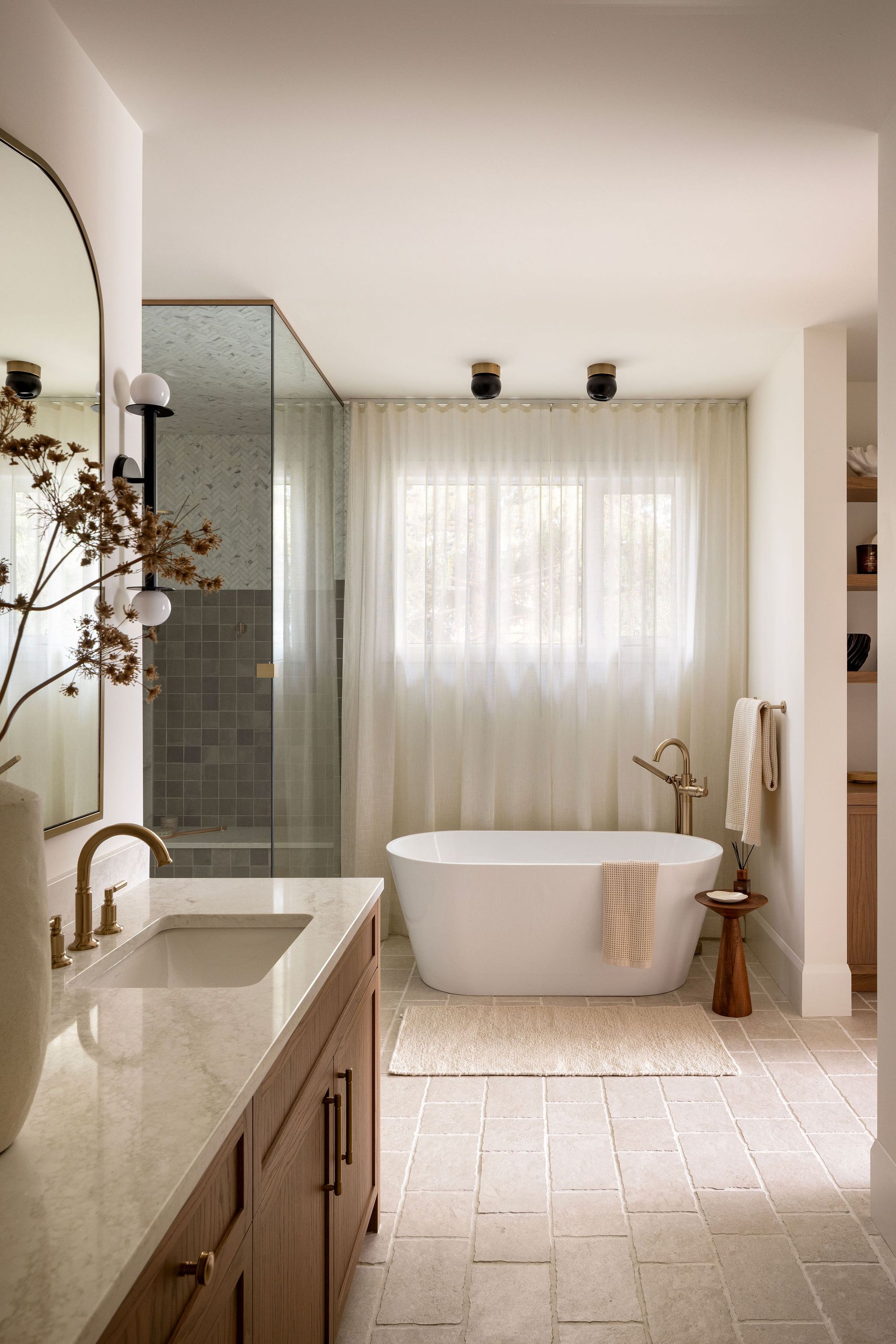 Primary ensuite with freestanding tub in The Charlotte home