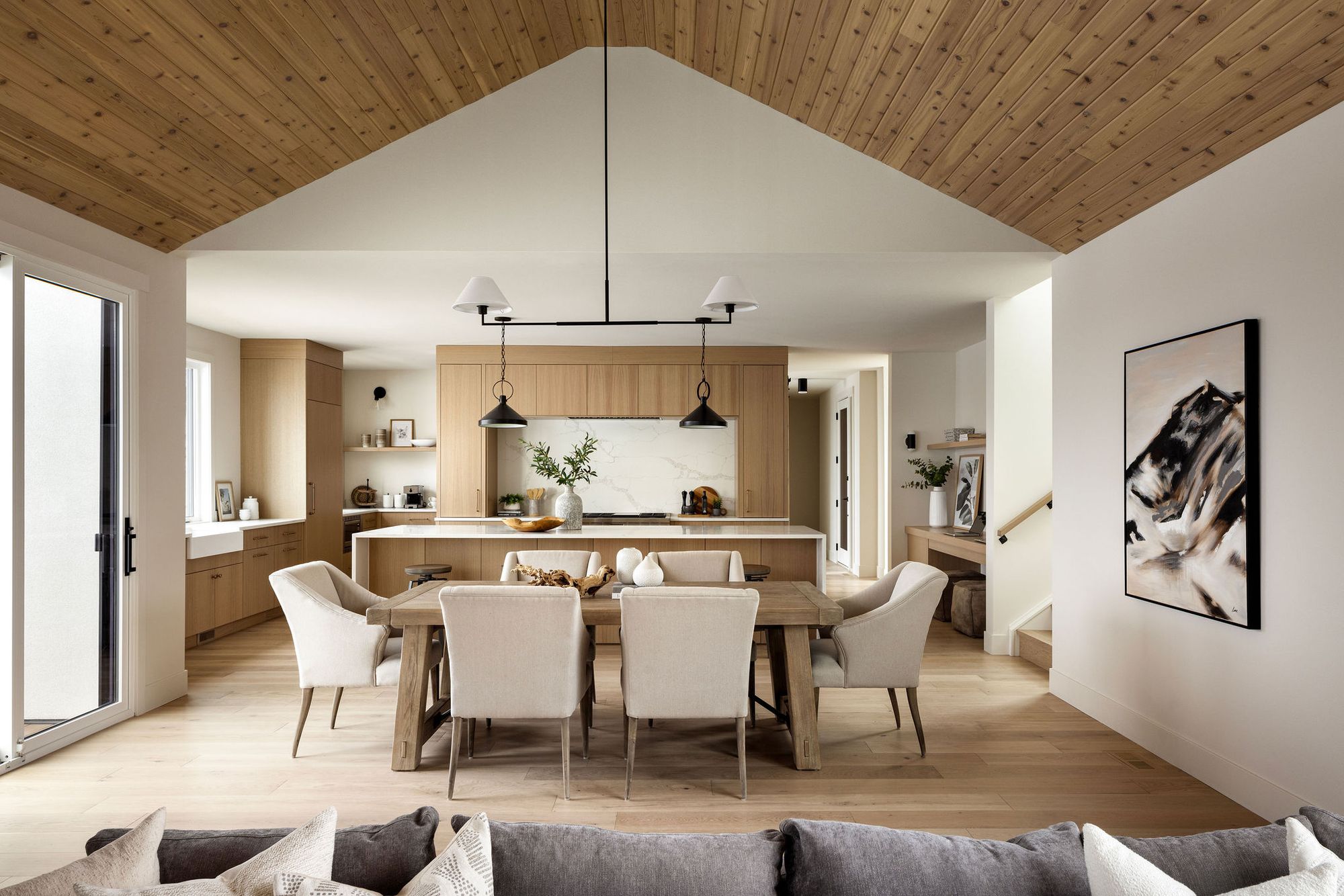 Open living and dining room in the Priddis home