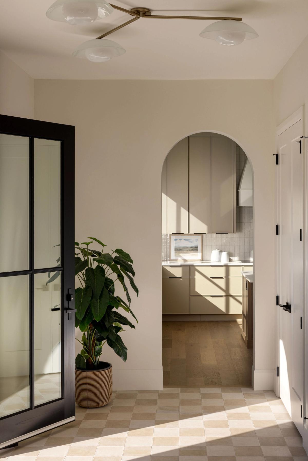 Entry with arched doorway in the Upper Mount Royal 2 home