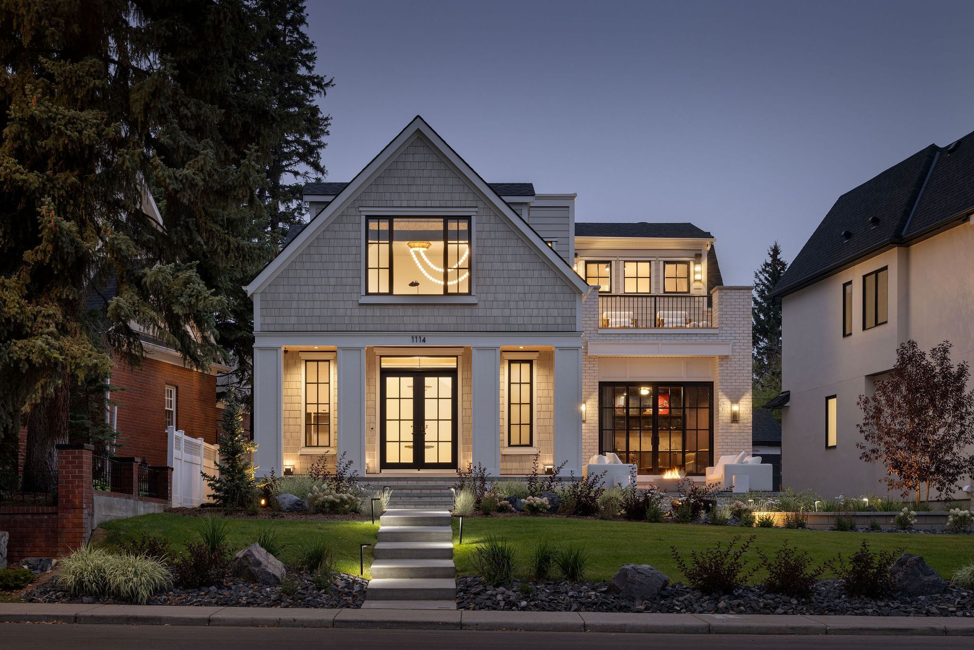 Front exterior of The Charlotte home at dusk
