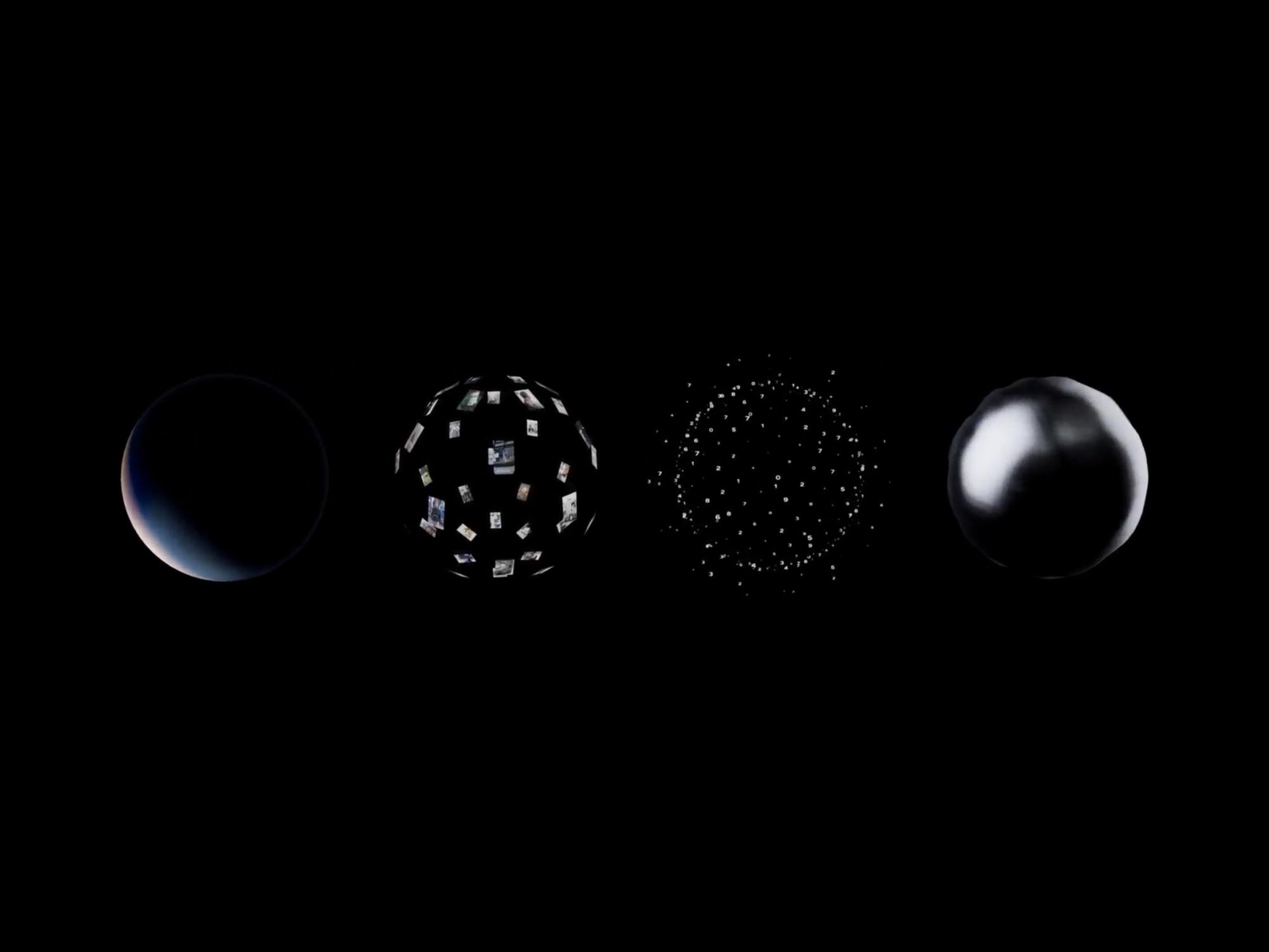 Four globes made of various materials on a black background